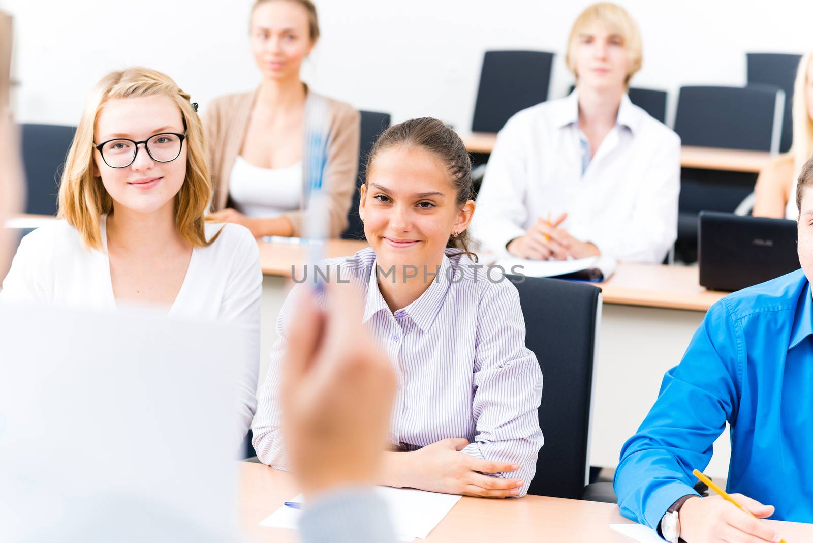 image of a students listen attentively to the teacher