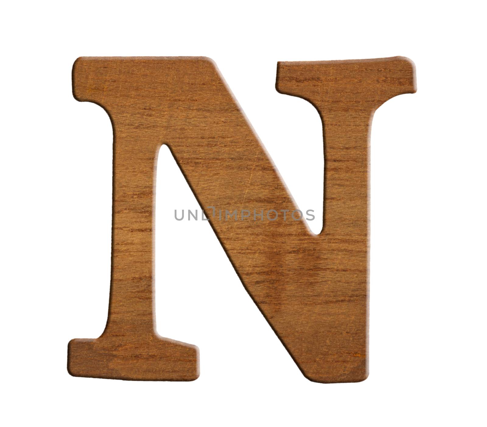 Alphabet made from wood, isolated on white background.