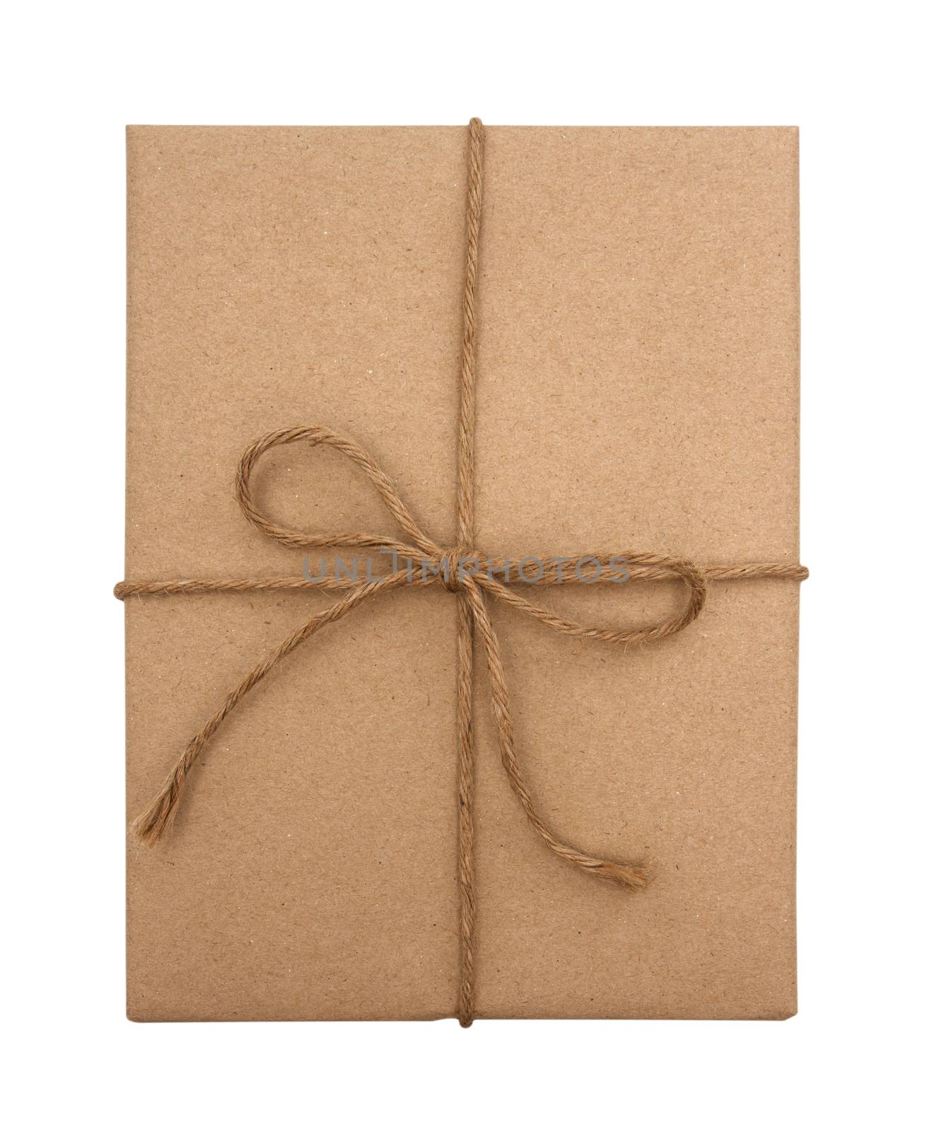 Brown paper package tied with string on a white background