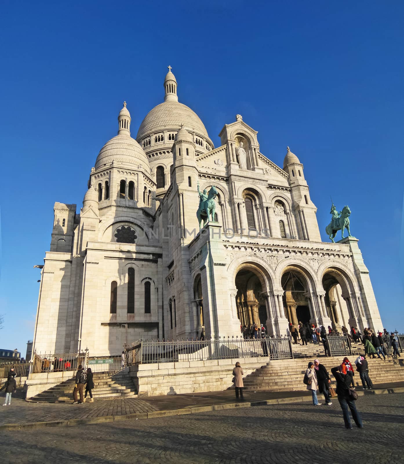 PARIS, FRANCE - December 26: Basilica of Sacre Coeur on December 26, 2008. In the center it is located the Bibliotheque publique d'information, and Musee National d'Art Moderne.