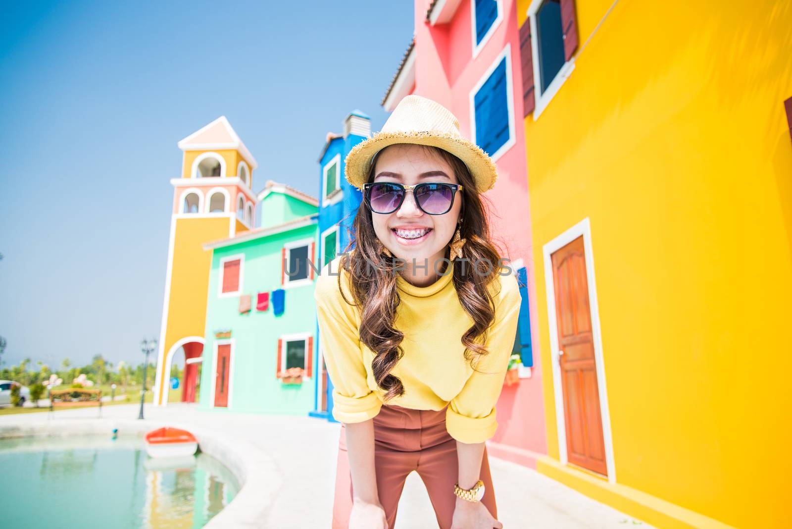 Portrait of beautiful young woman with colorful tone