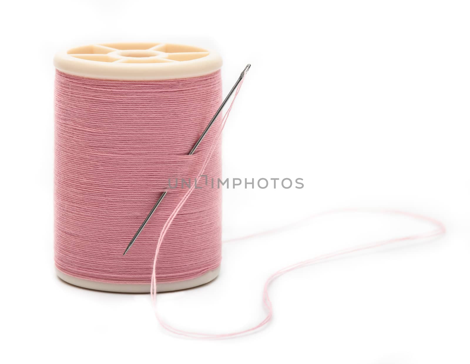 thread with needle isolated on white