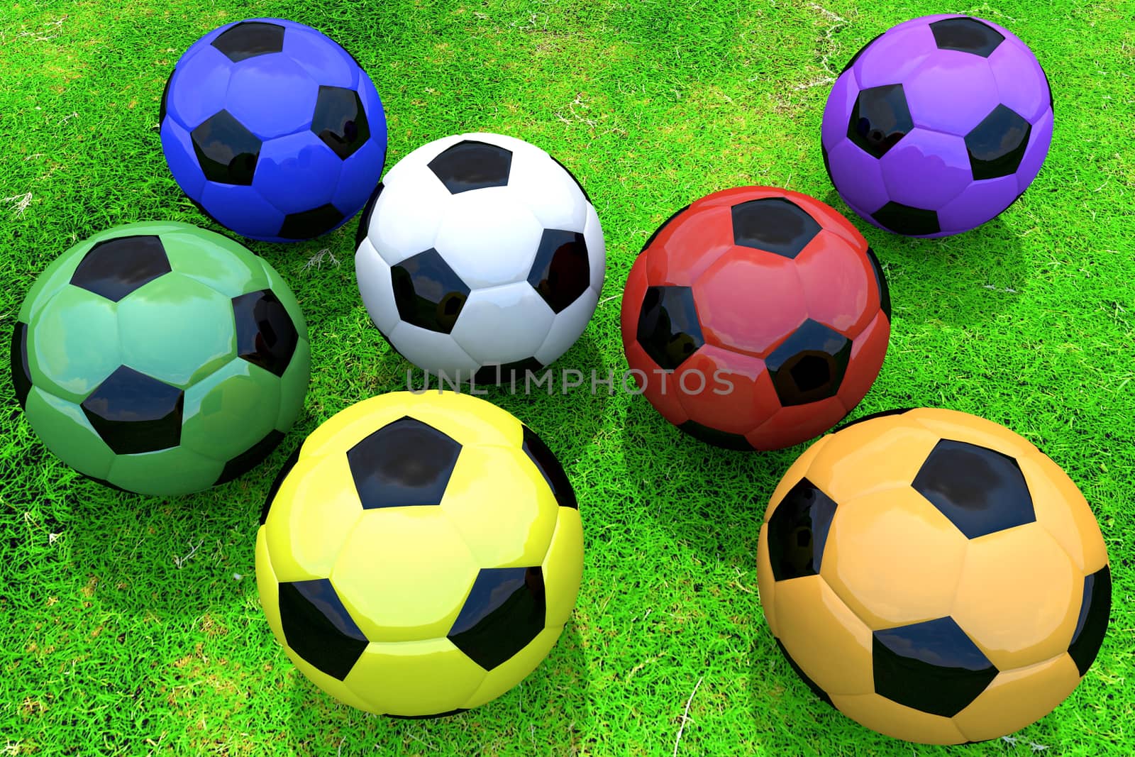 Colored soccer balls on grass