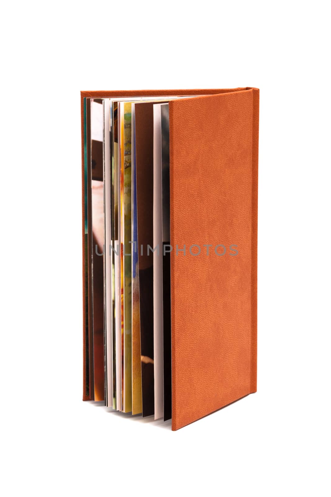 photograph album in a brown cover on a white background