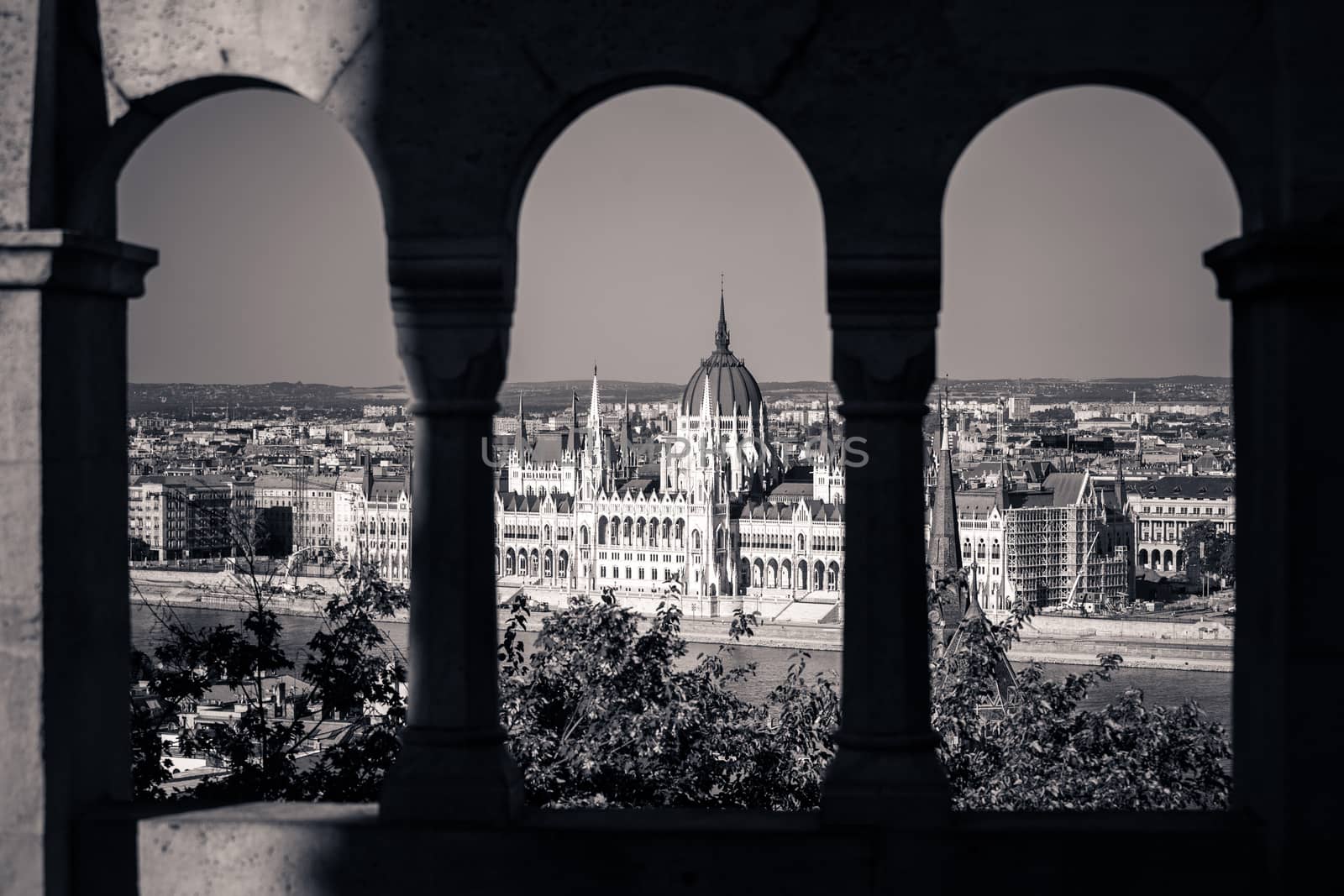 View of Hungarian Parliament Building with customers at Buda Castle restaurant, Budapest, Hungary