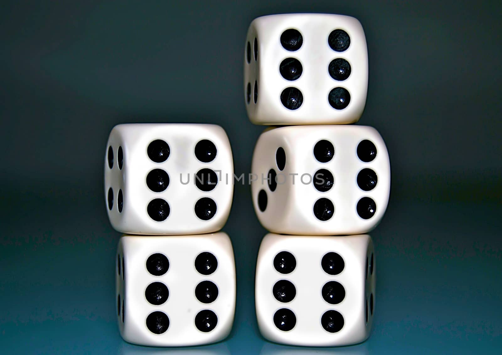 Composition with five casino dices showing number six on each face