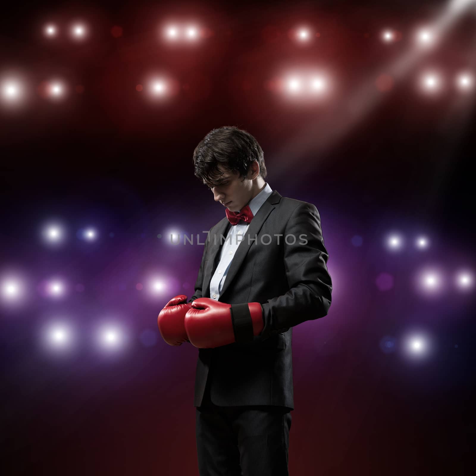 businessman with boxing gloves in the ring by adam121