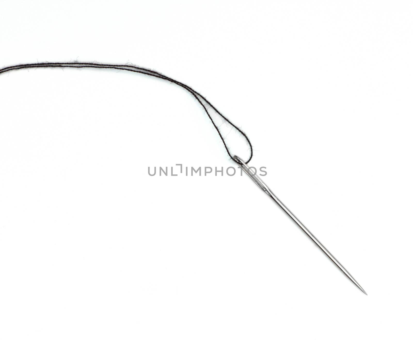 black thread and needle isolated on white