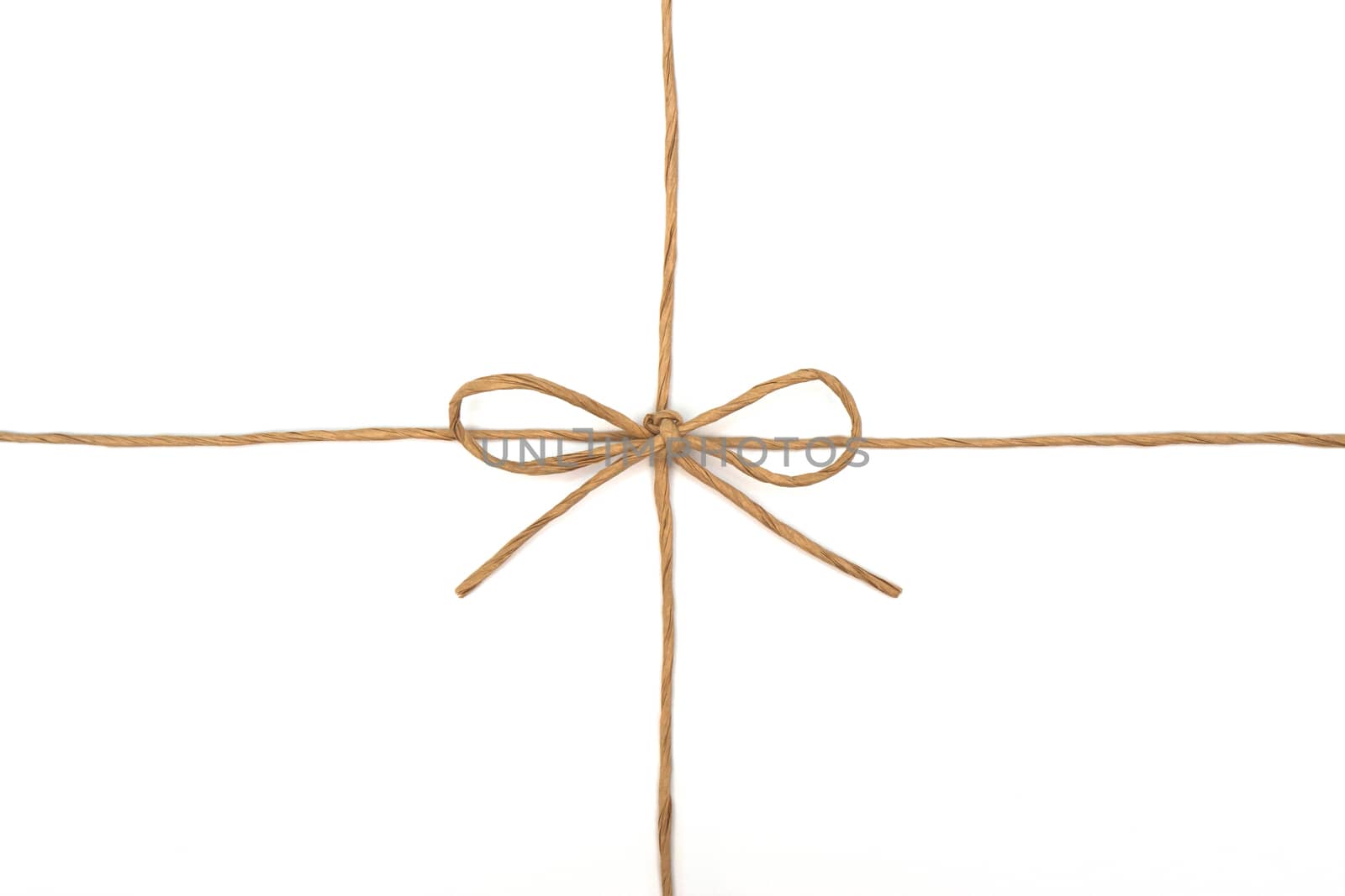 String tied in a bow on white