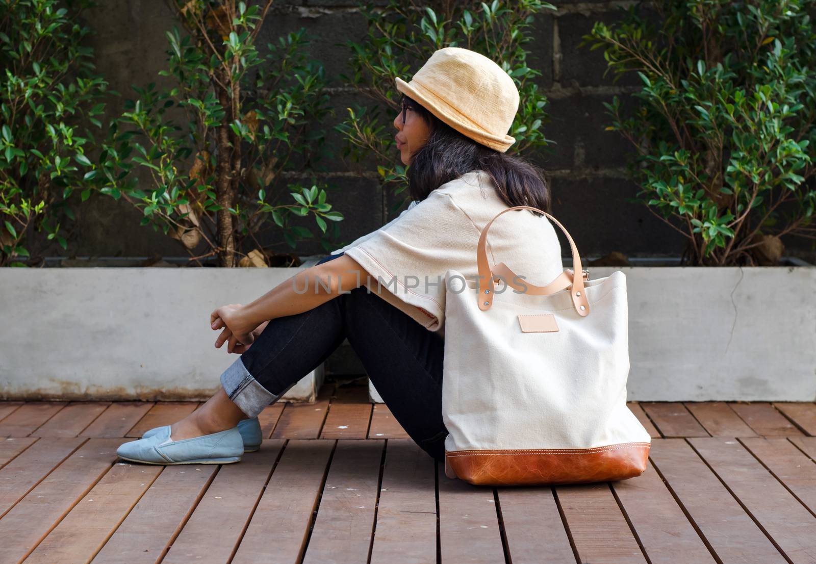 Young fashion woman with a canvas bag, Outdoor portrait