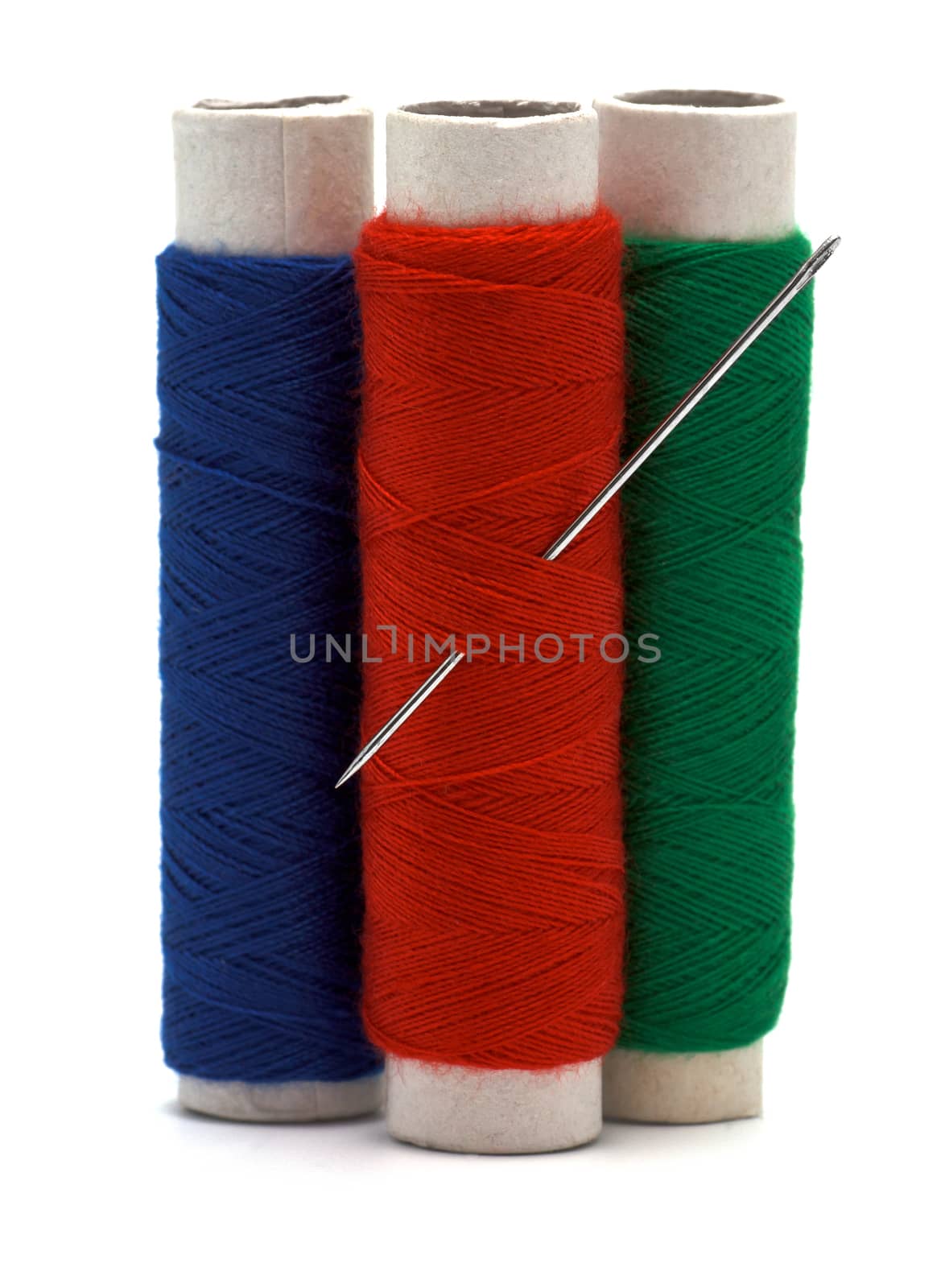 Needle and thread isolated over white background