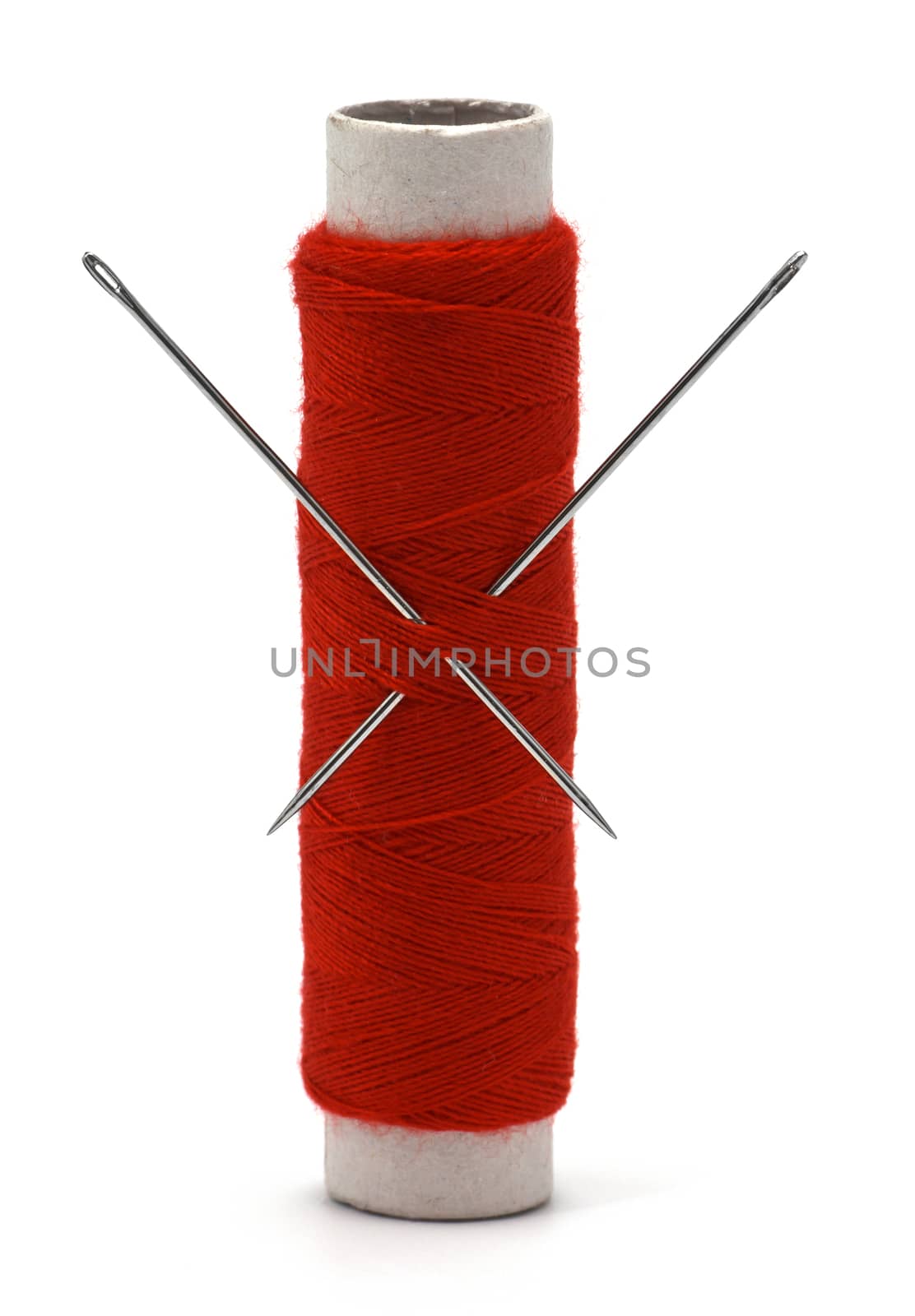 Needle and thread isolated over white background