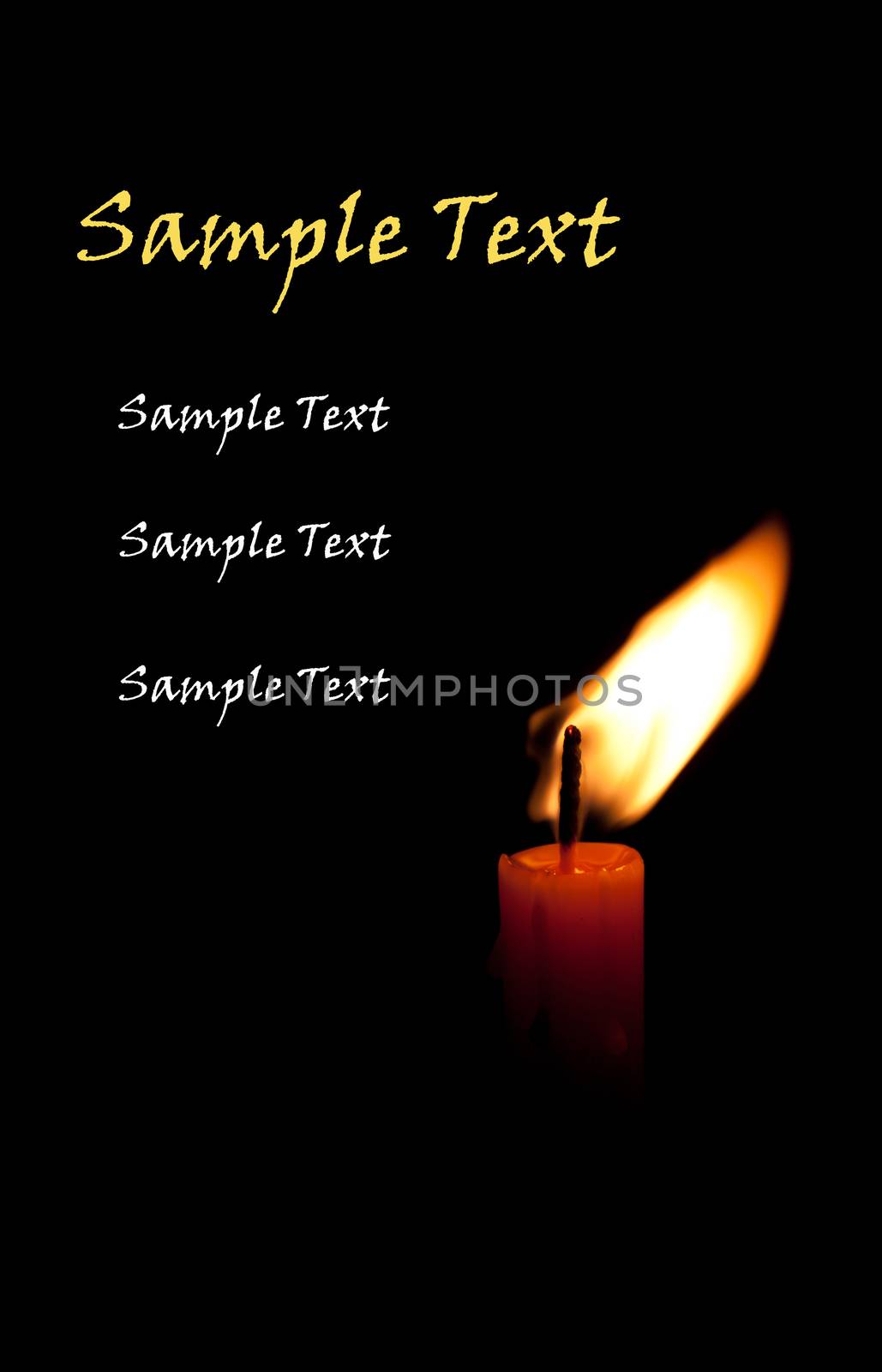 single burning candle isolated in front of black background