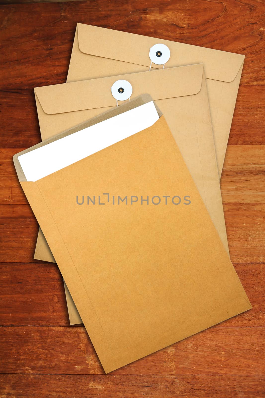 Brown Envelope document on a wooden desk