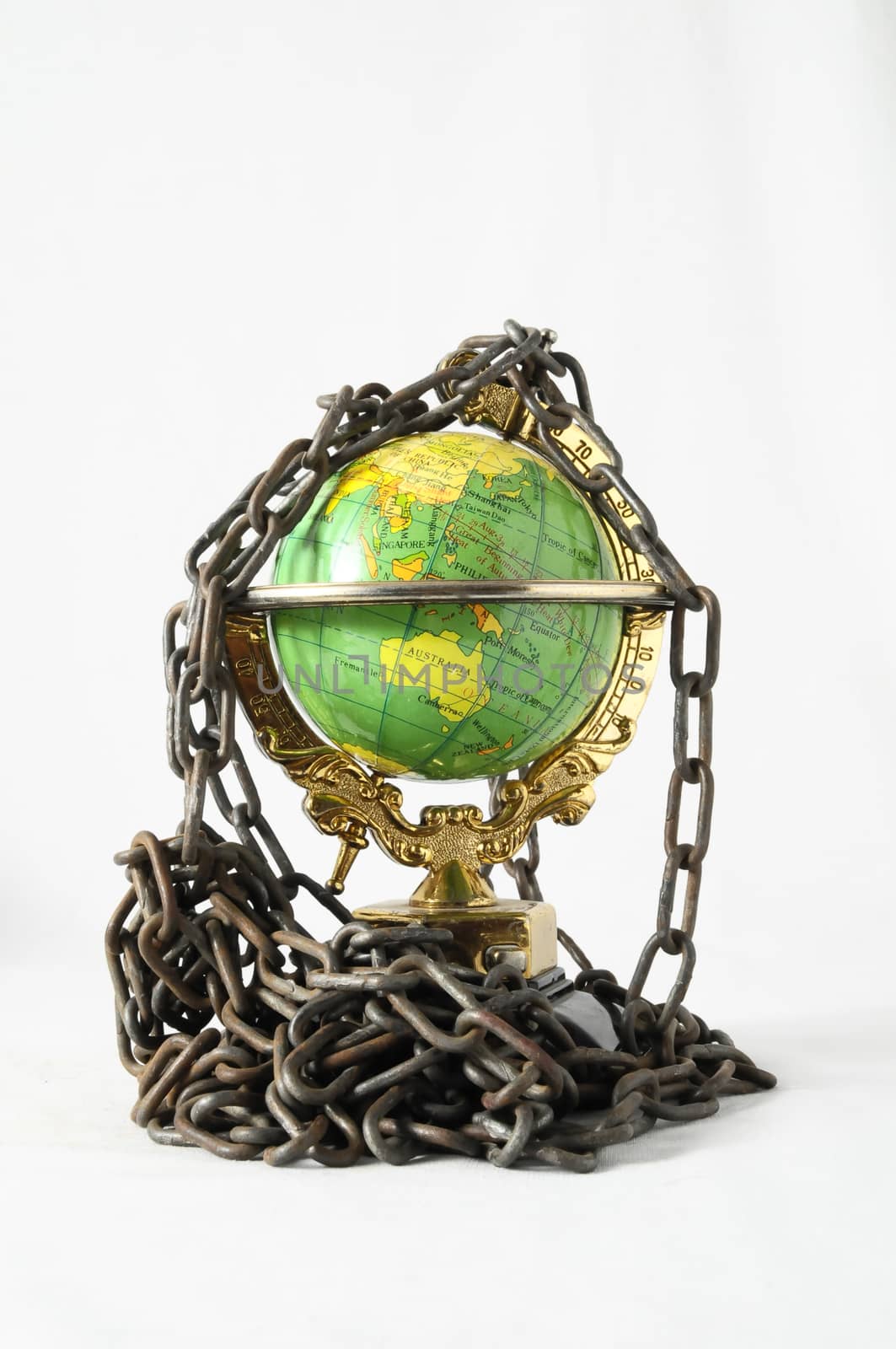 Earth globe close in chain and padlock