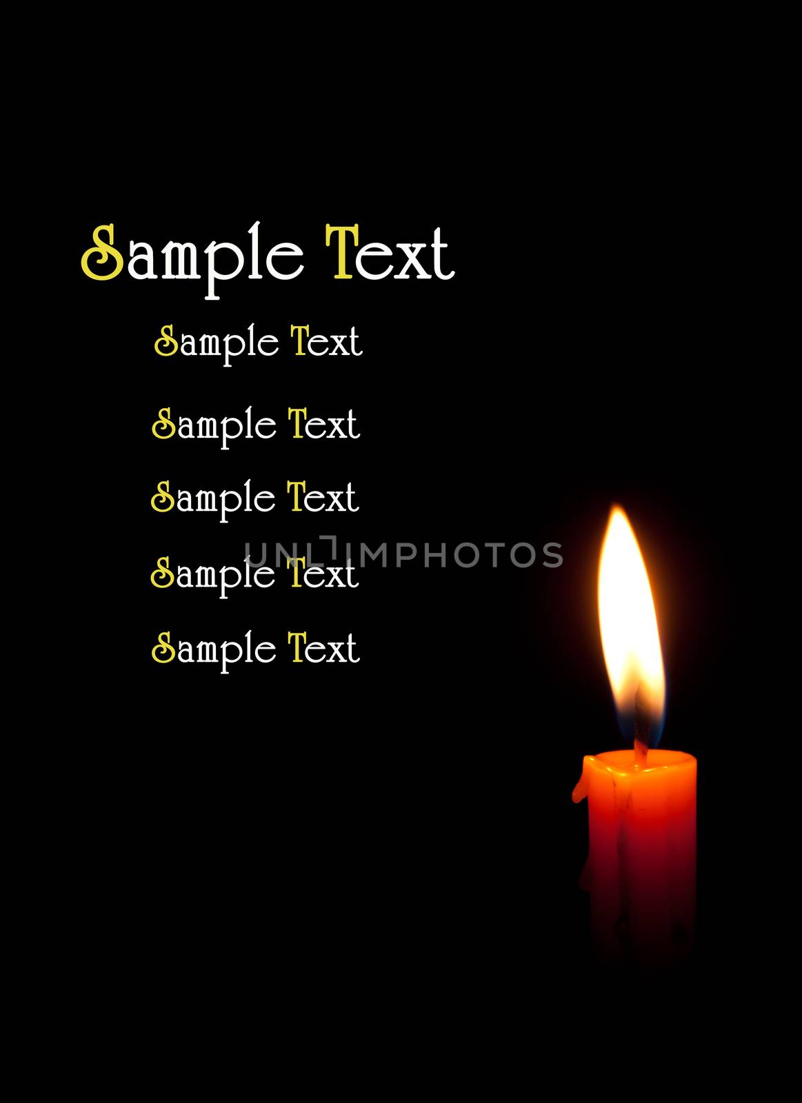 single burning candle isolated in front of black background