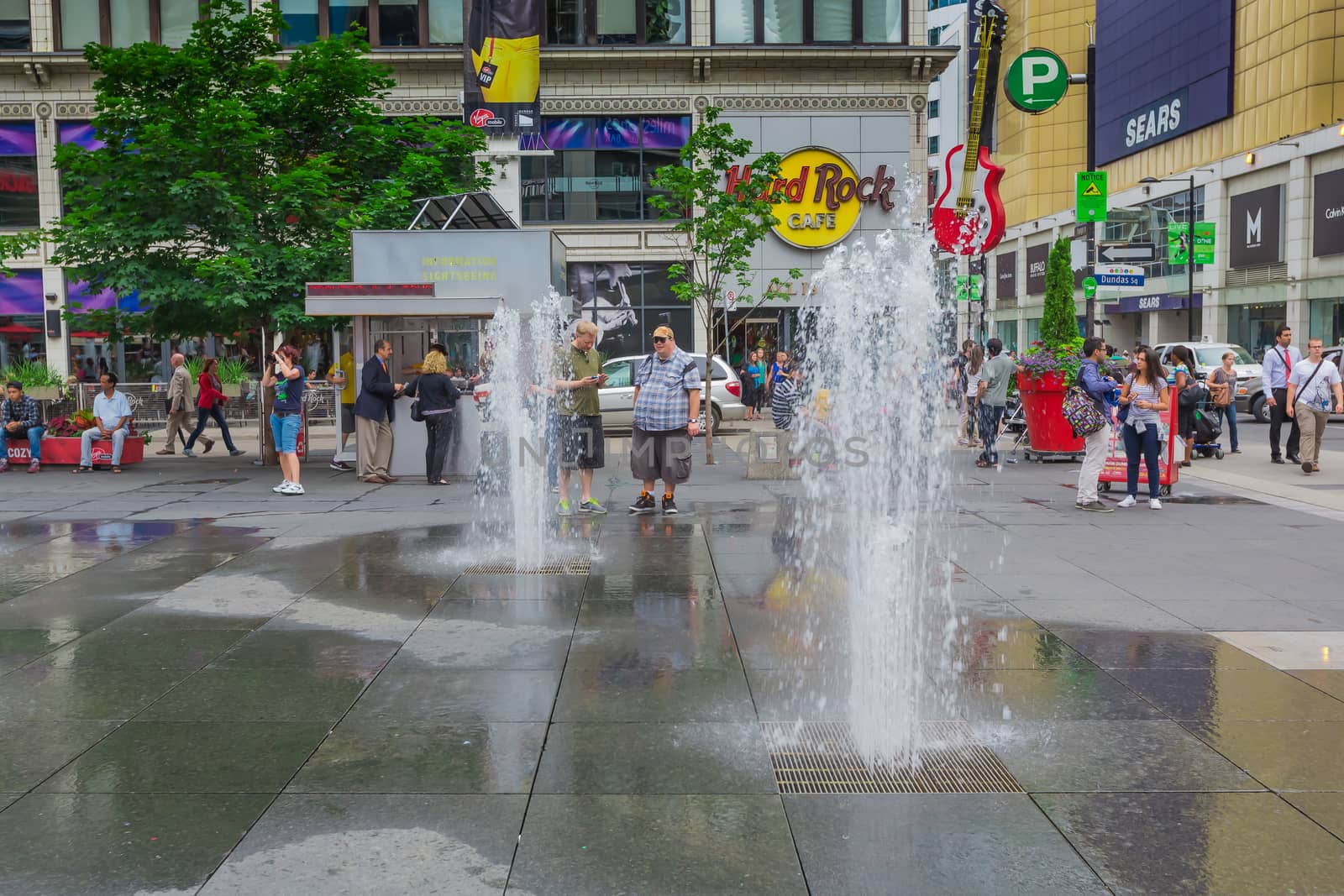 A fountain in downtown by petkolophoto