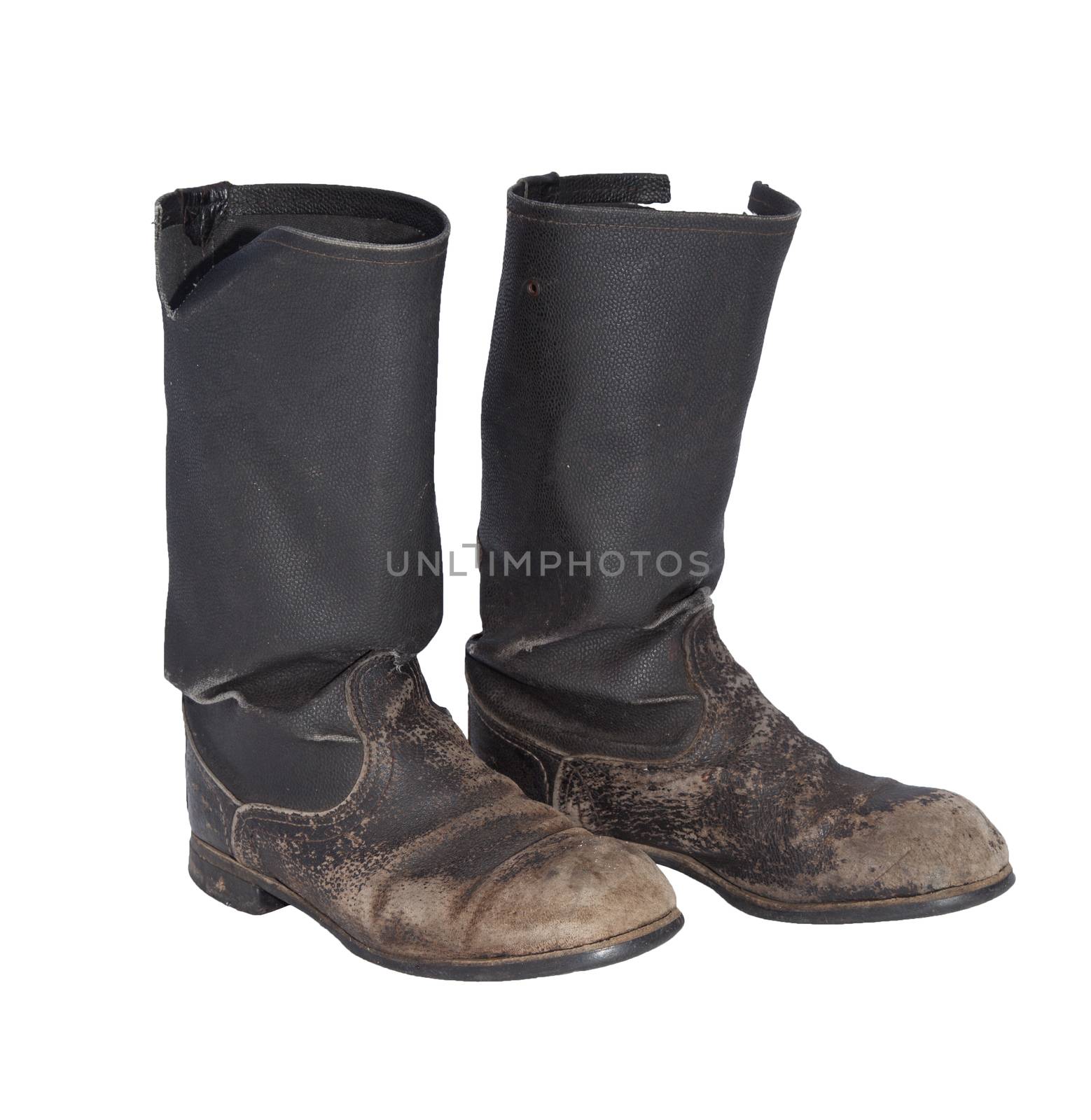 Old tarpaulin military boots isolated on a white background 