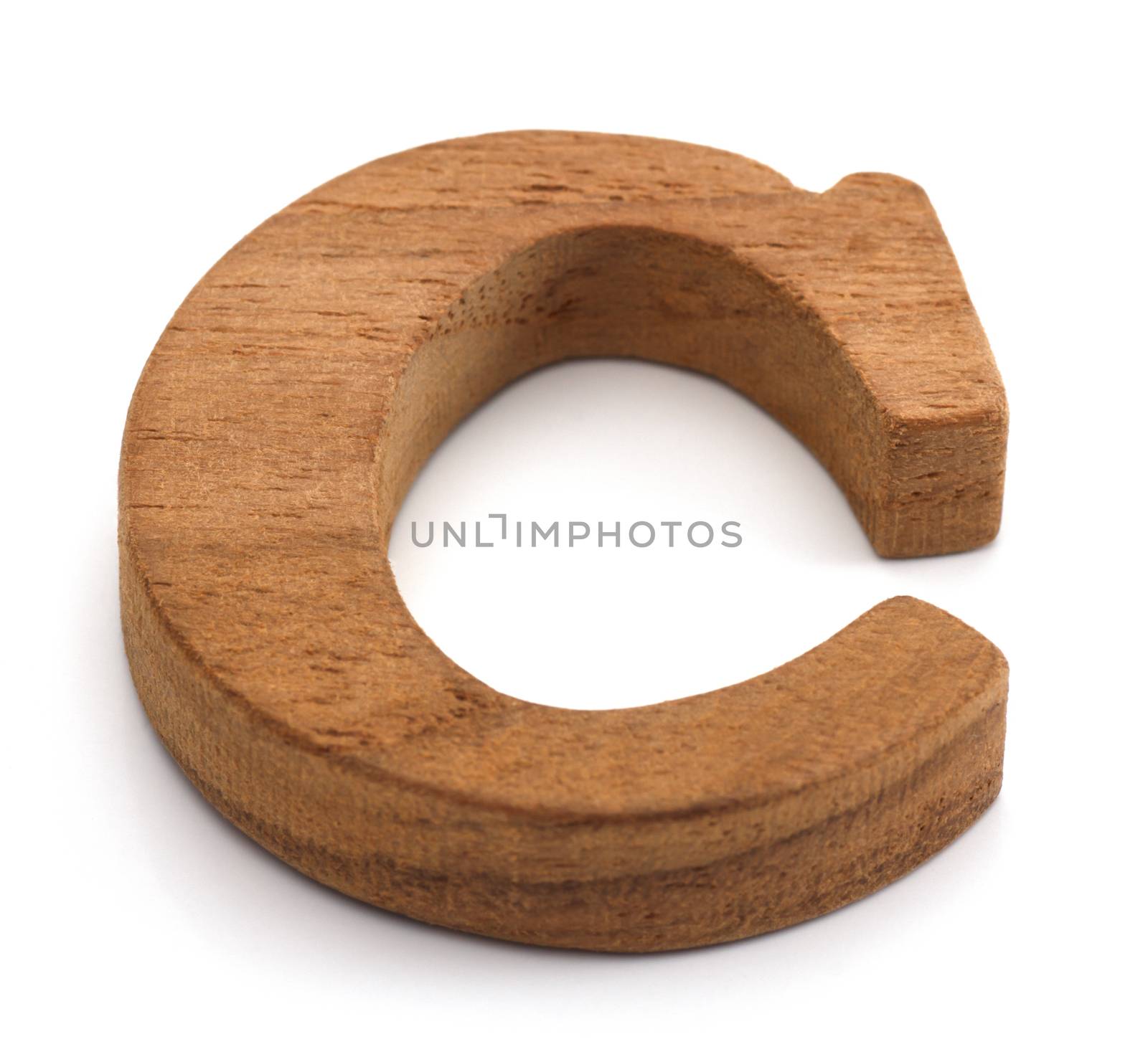 Alphabet made from wood on white