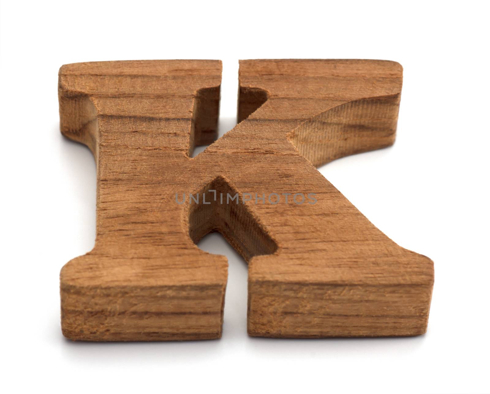 Alphabet made from wood on white