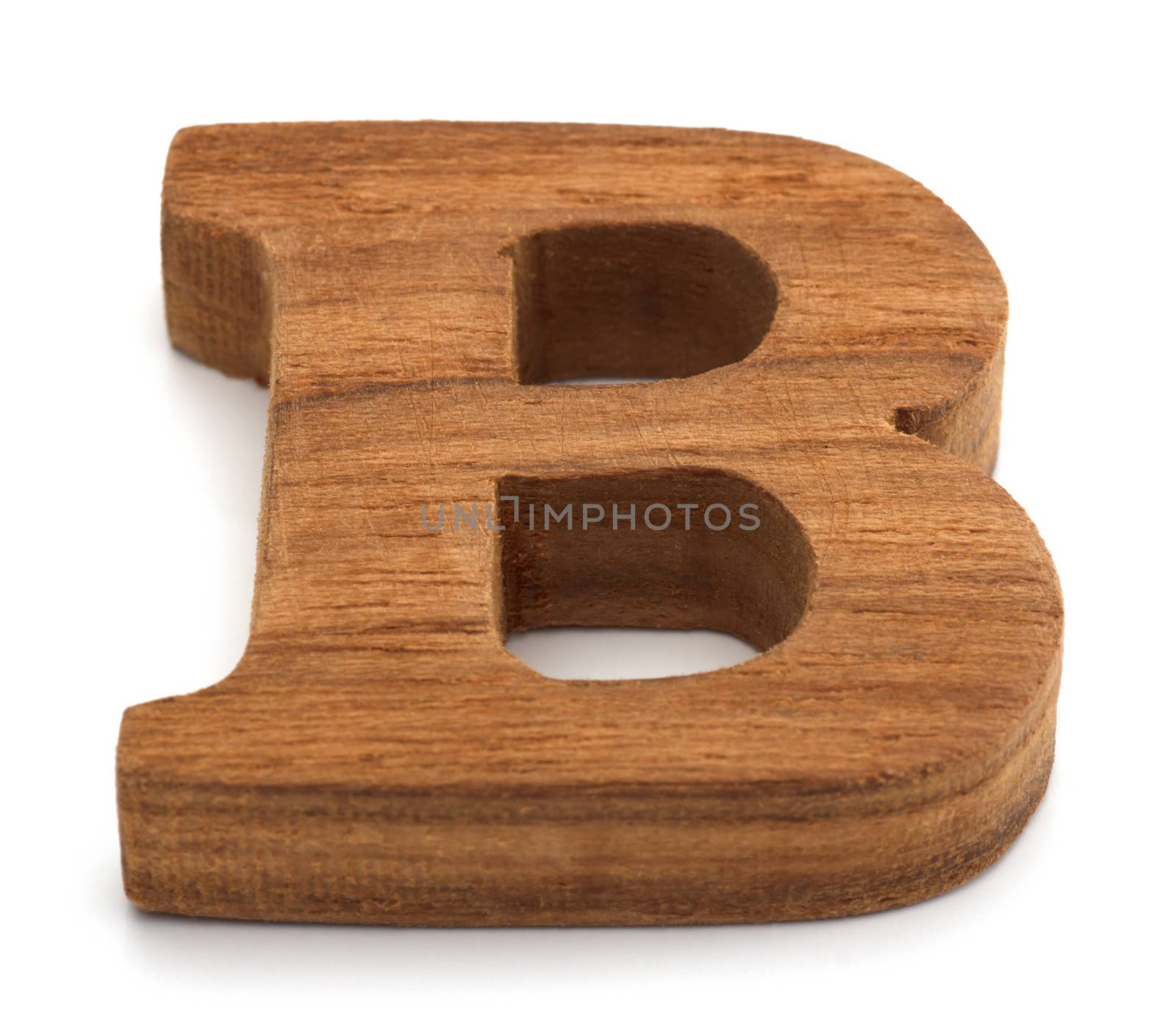 Alphabet made from wood on white