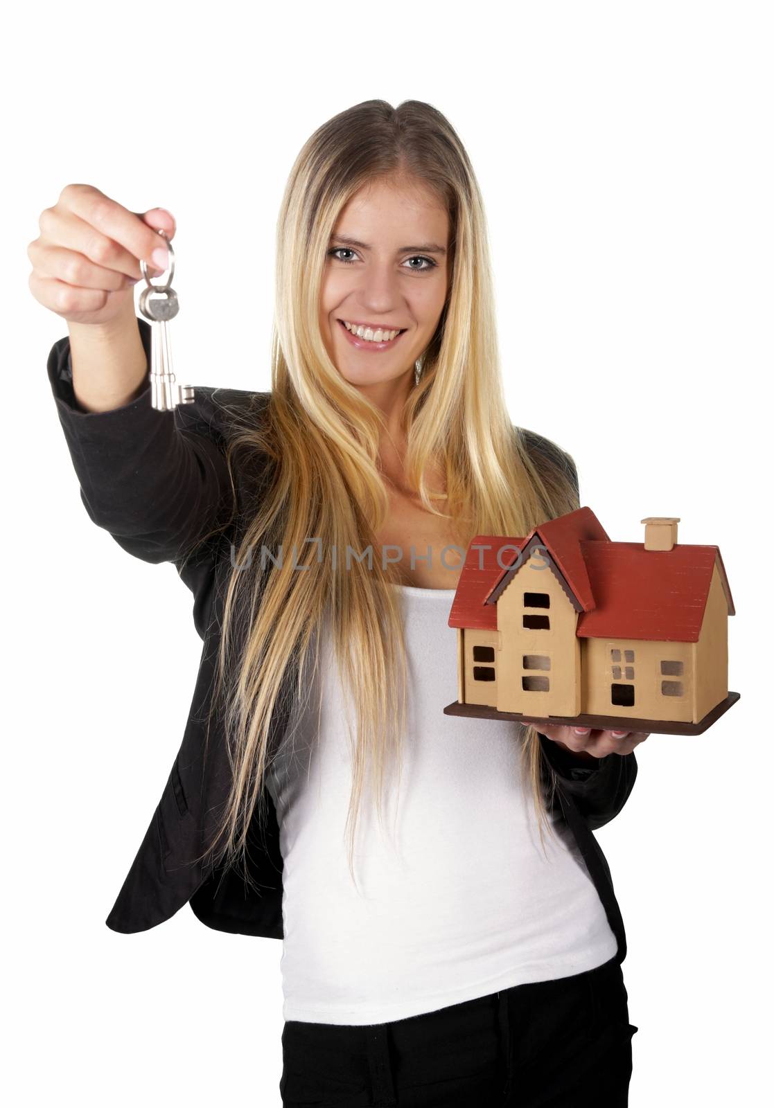 Pretty smiling estate agent woman with keys and model house