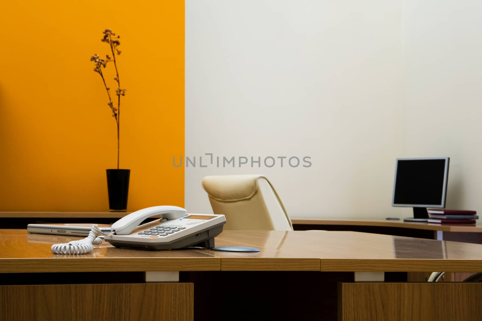 phone on a desk in a modern office