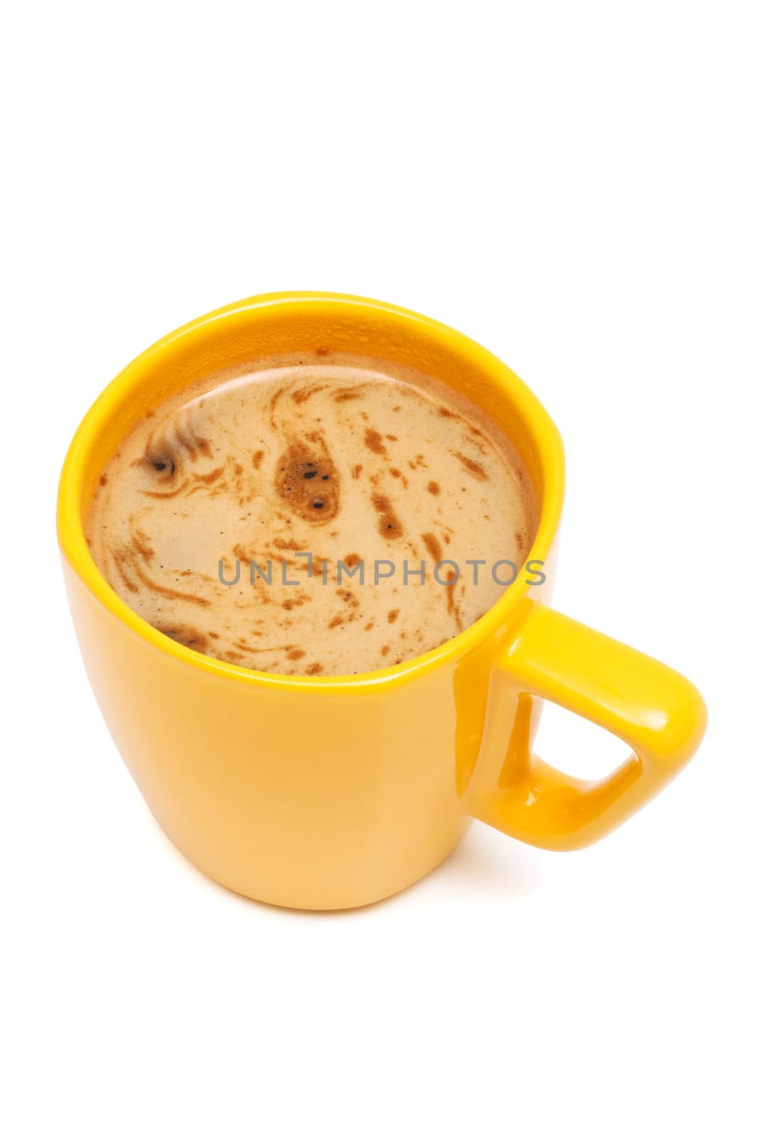 Yellow mug from coffee on a white background