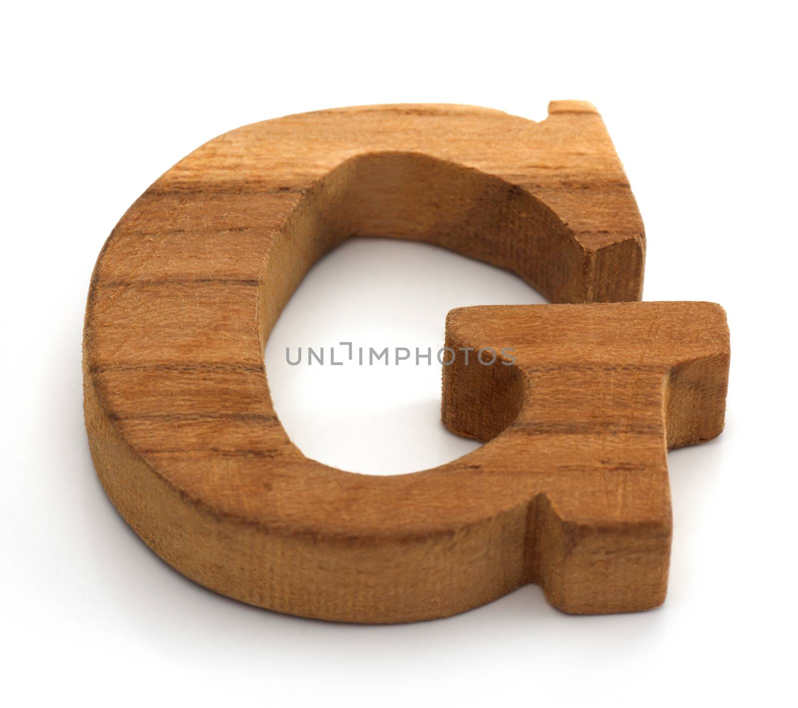 Alphabet made from wood on white