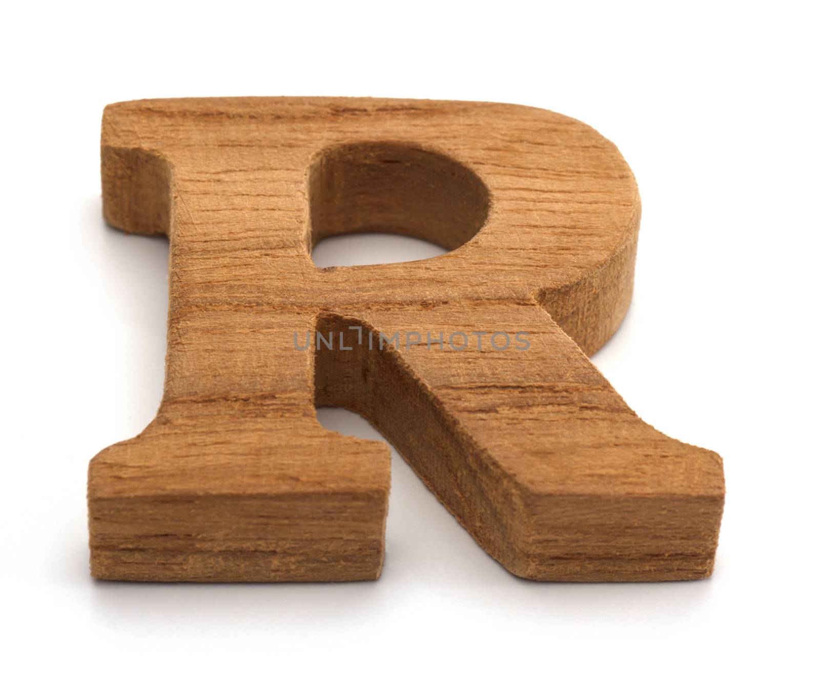 Alphabet made from wood on white