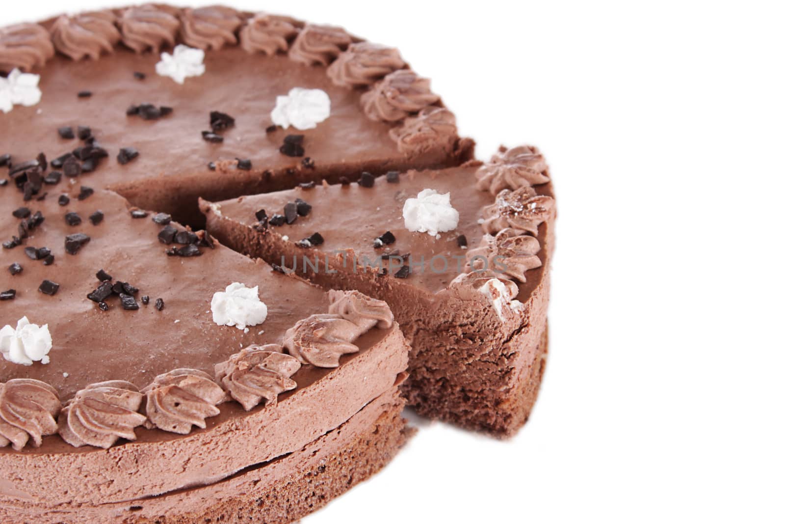 Part of round chocolate cake isolated on white