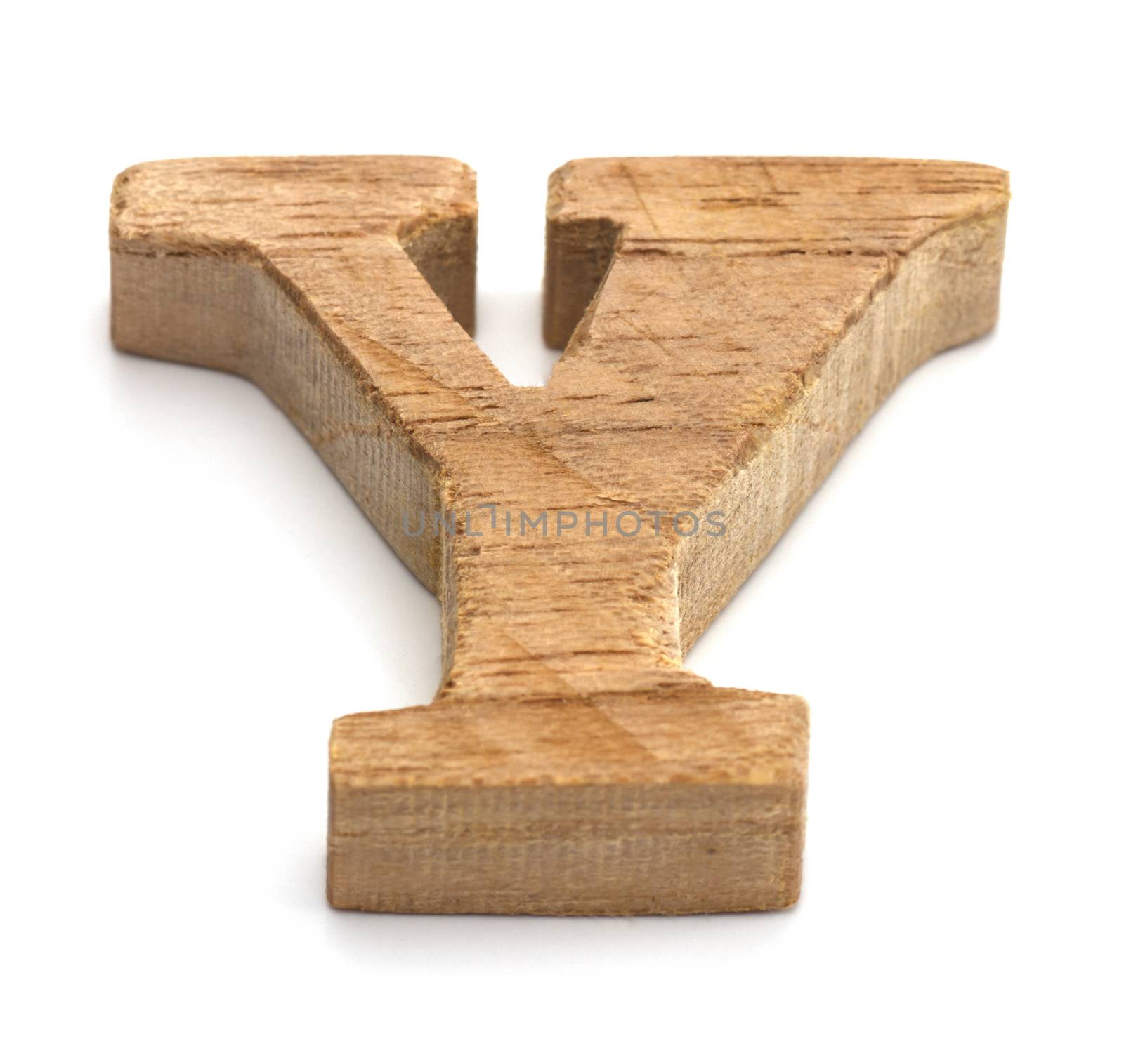 Alphabet made from wood on white