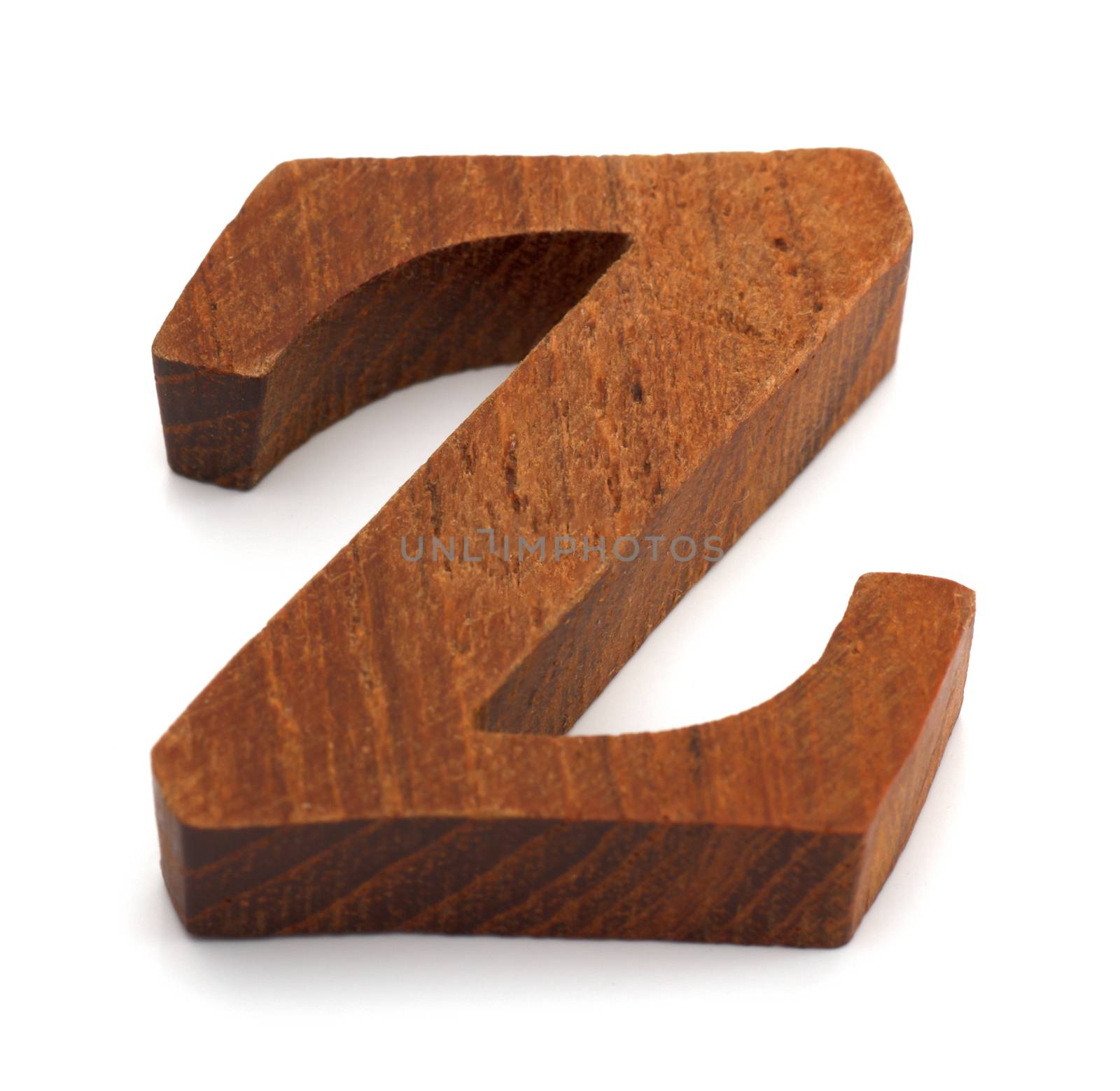 Alphabet made from wood on white
