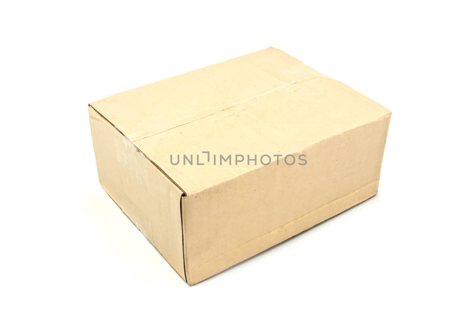 Close brown paper box on white