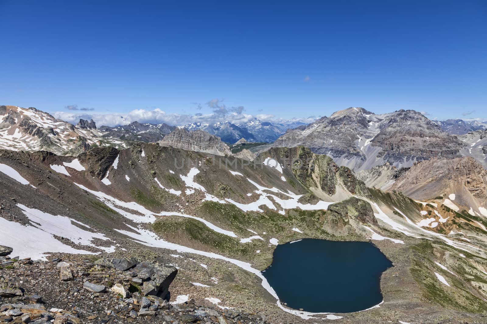 Image of the Lac Blanc (White Lake) located at 2699 m on Vallee de la Claree (Claree Valley) in Hautes Alpes department in France. The place is located in one of the wildest hiking trail in the high French Alps.