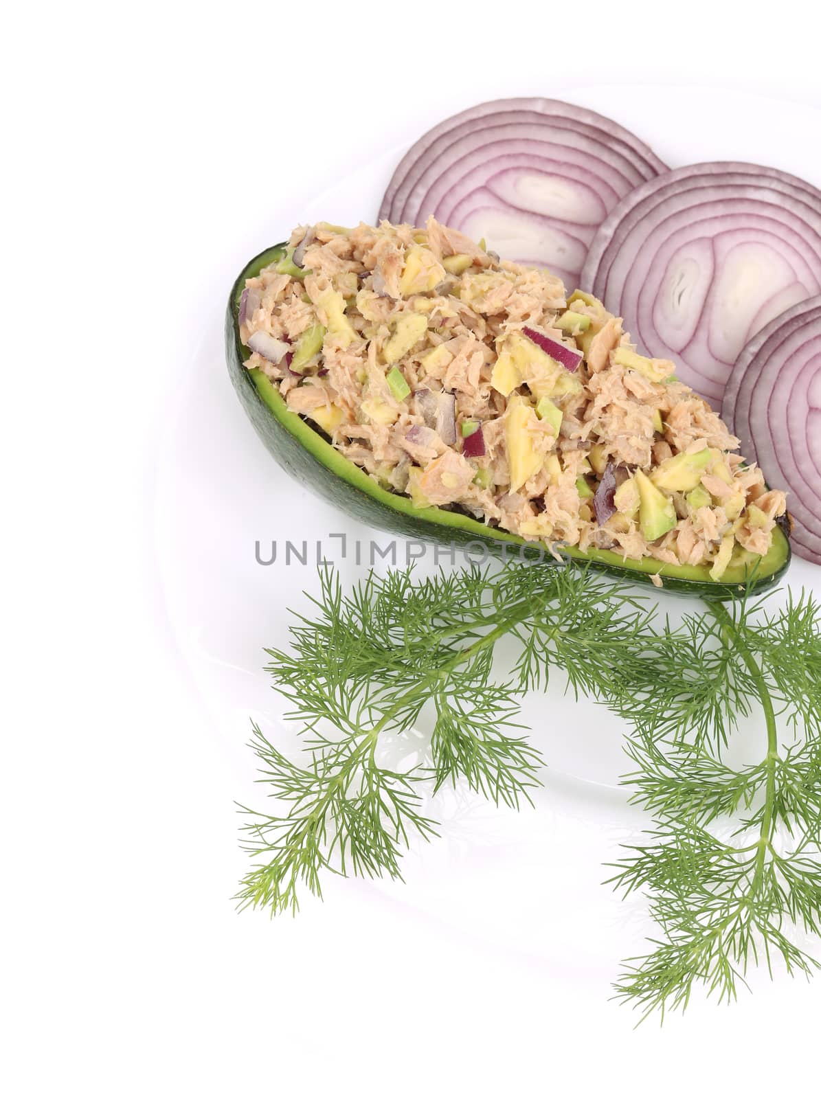 Avocado salad and tuna. Isolated on a white background.