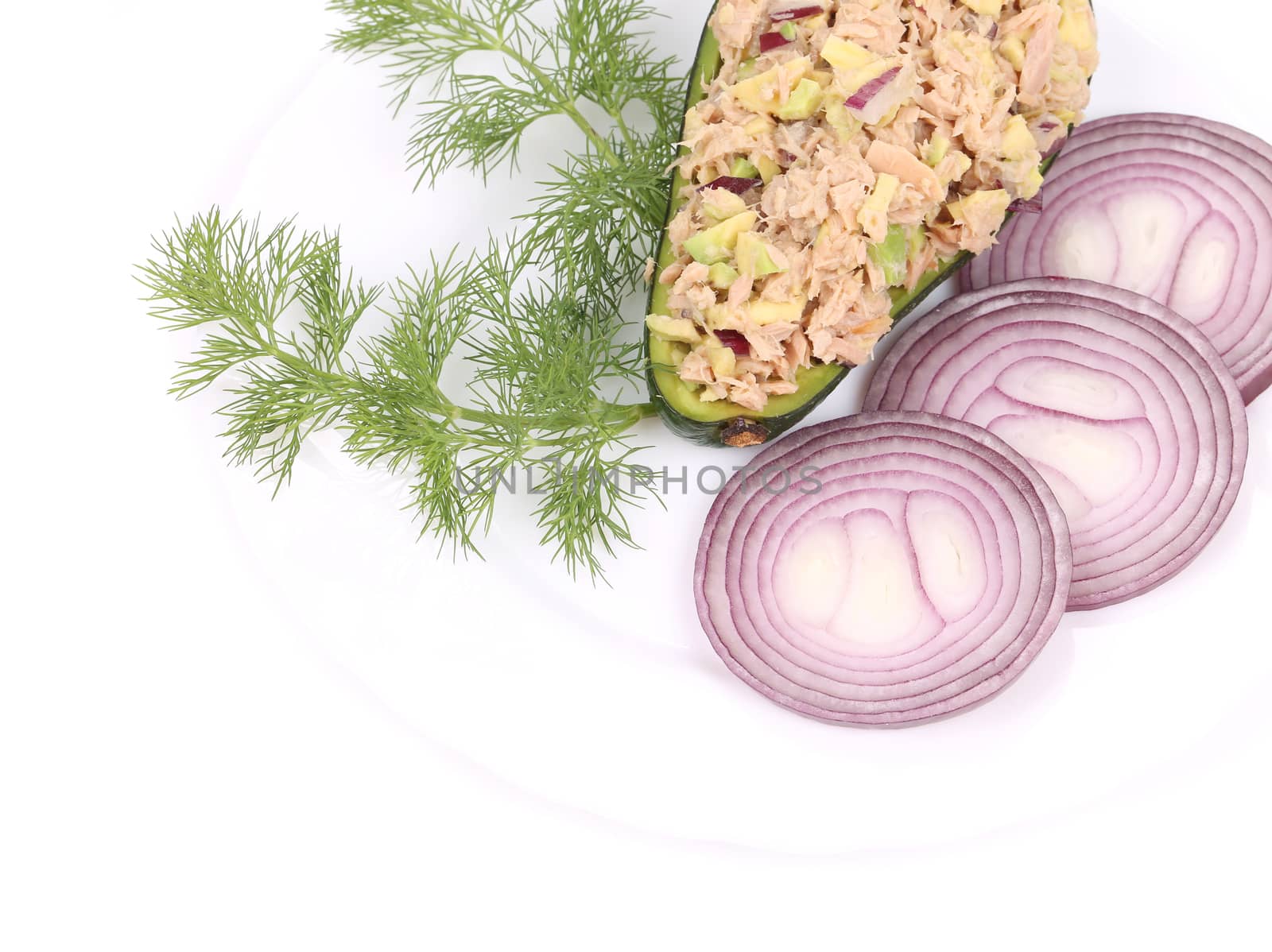 Avocado salad and tuna. Isolated on a white background.