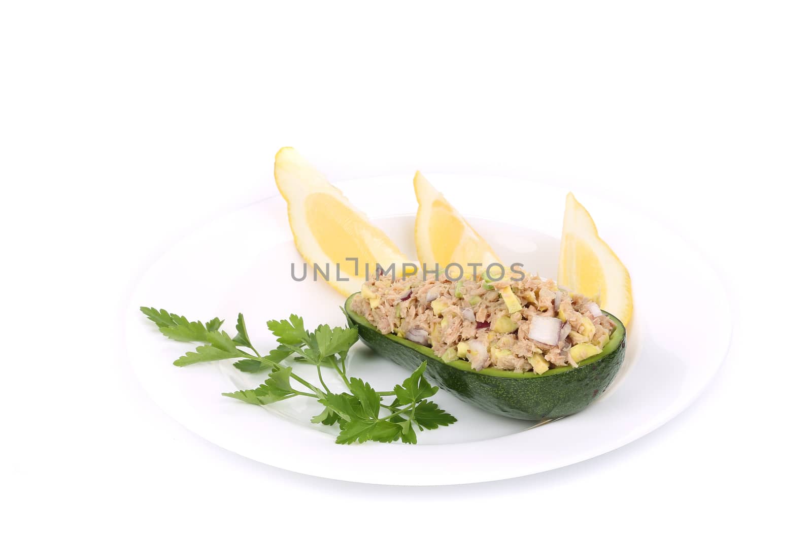 Avocado salad and tuna. Isolated on a white background.