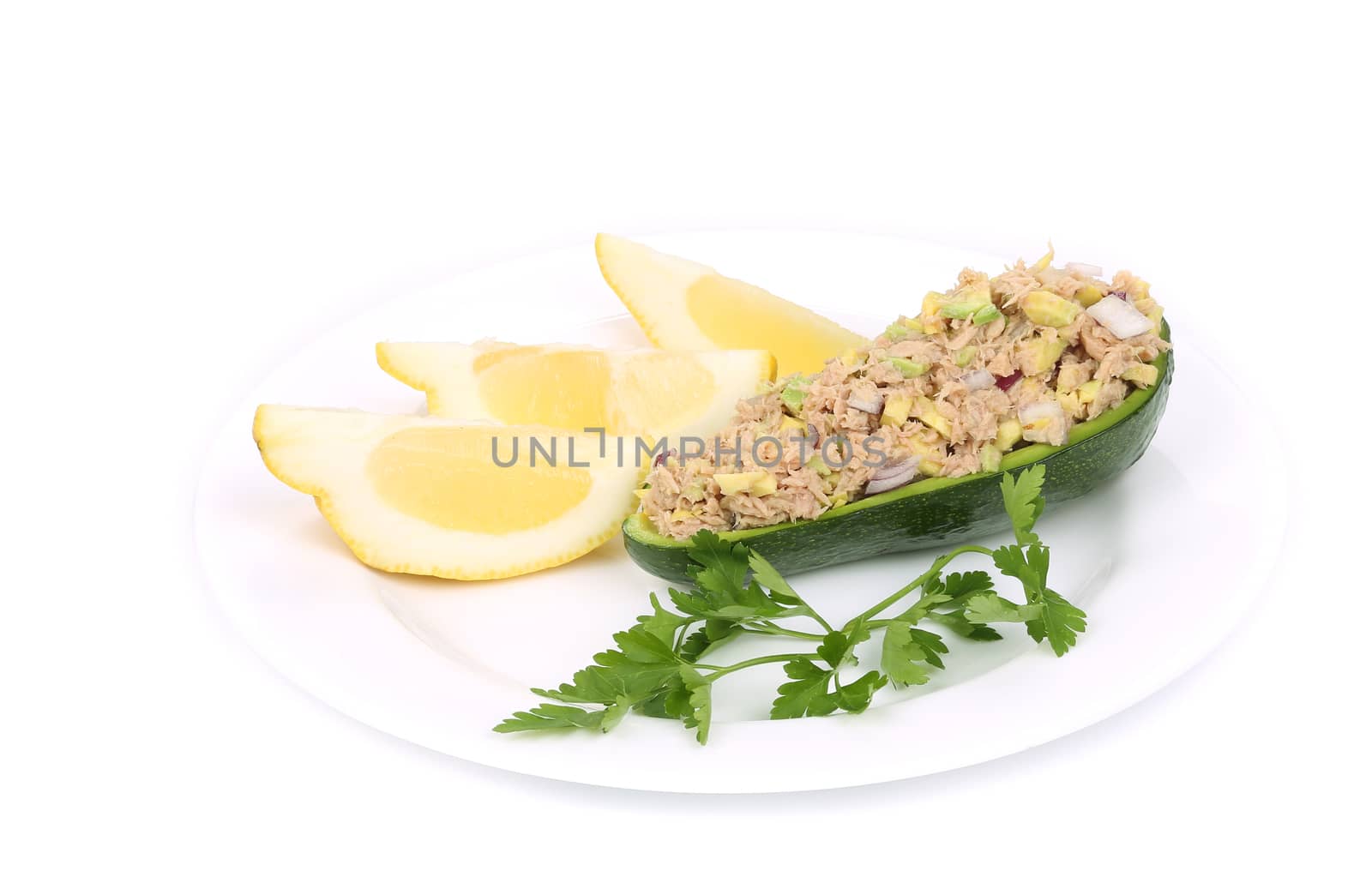 Avocado salad and tuna. Isolated on a white background.