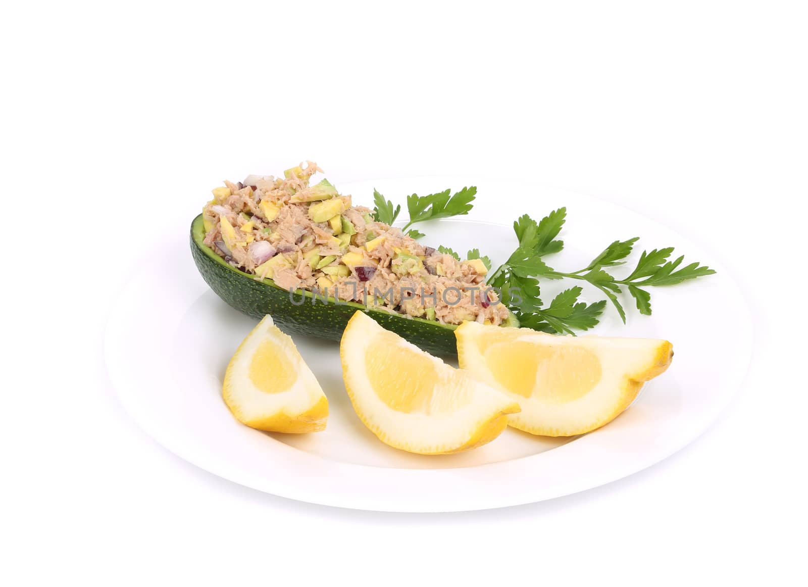 Avocado salad and tuna. Isolated on a white background.
