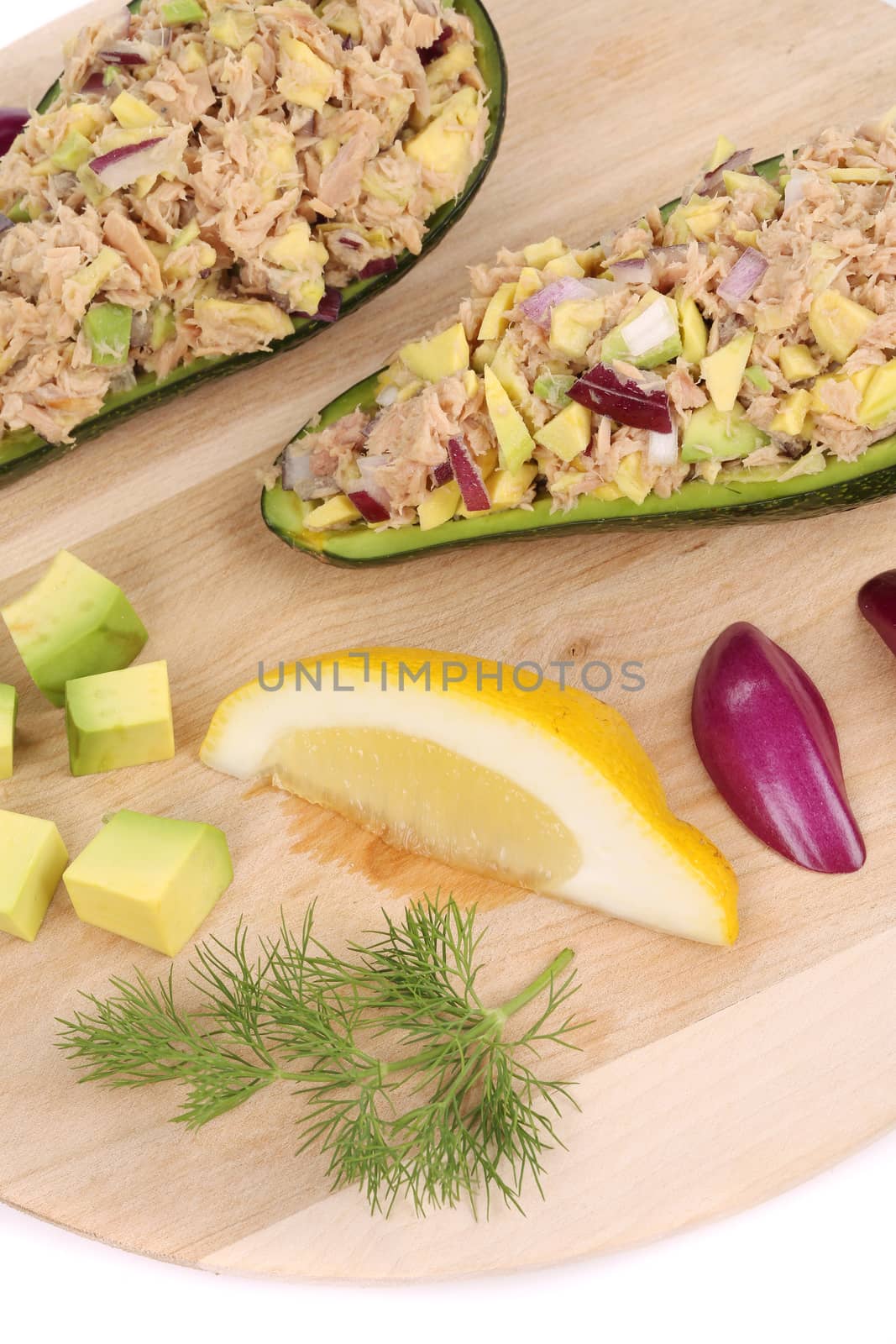 Avocado salad and tuna. Isolated on a white background.