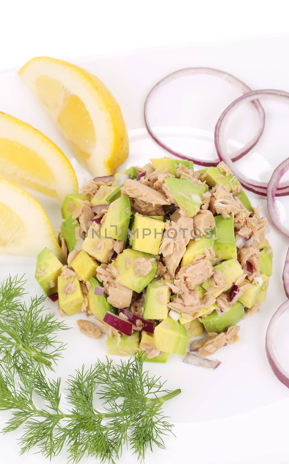 Avocado salad and tuna. Isolated on a white background.