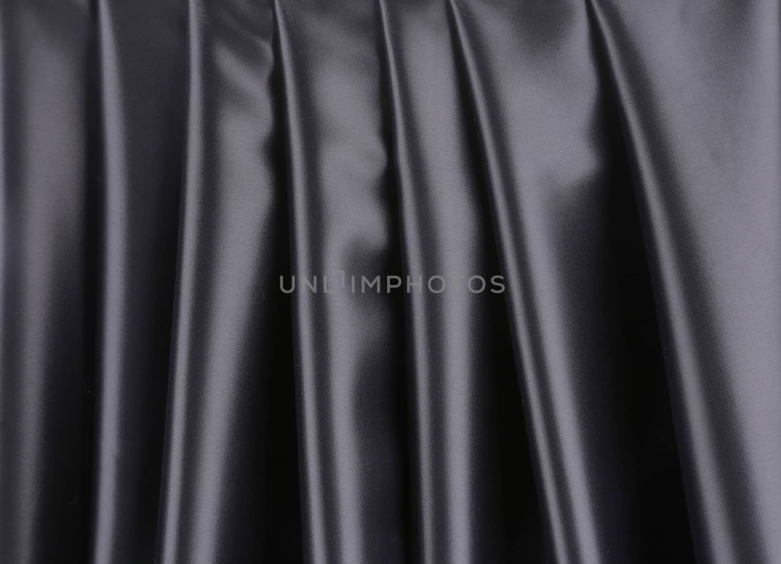 Black silk background.