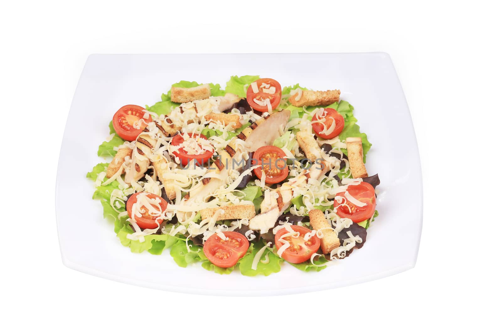 Caesar salad with parmesan. Isolated on a white background.