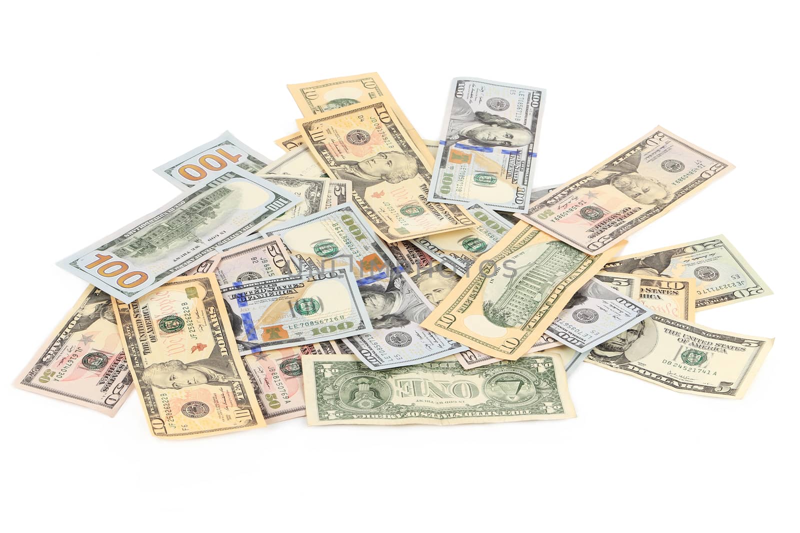 Heap of dollar bills. Isolated on a white background.