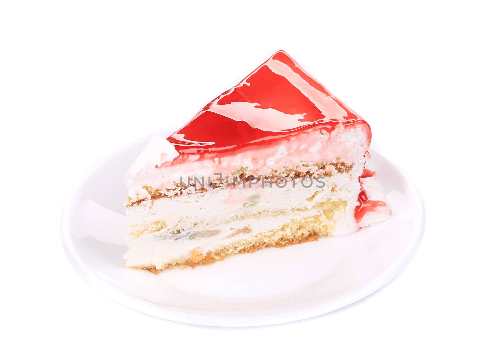 Portion of red layer cake. Isolated on a white background.