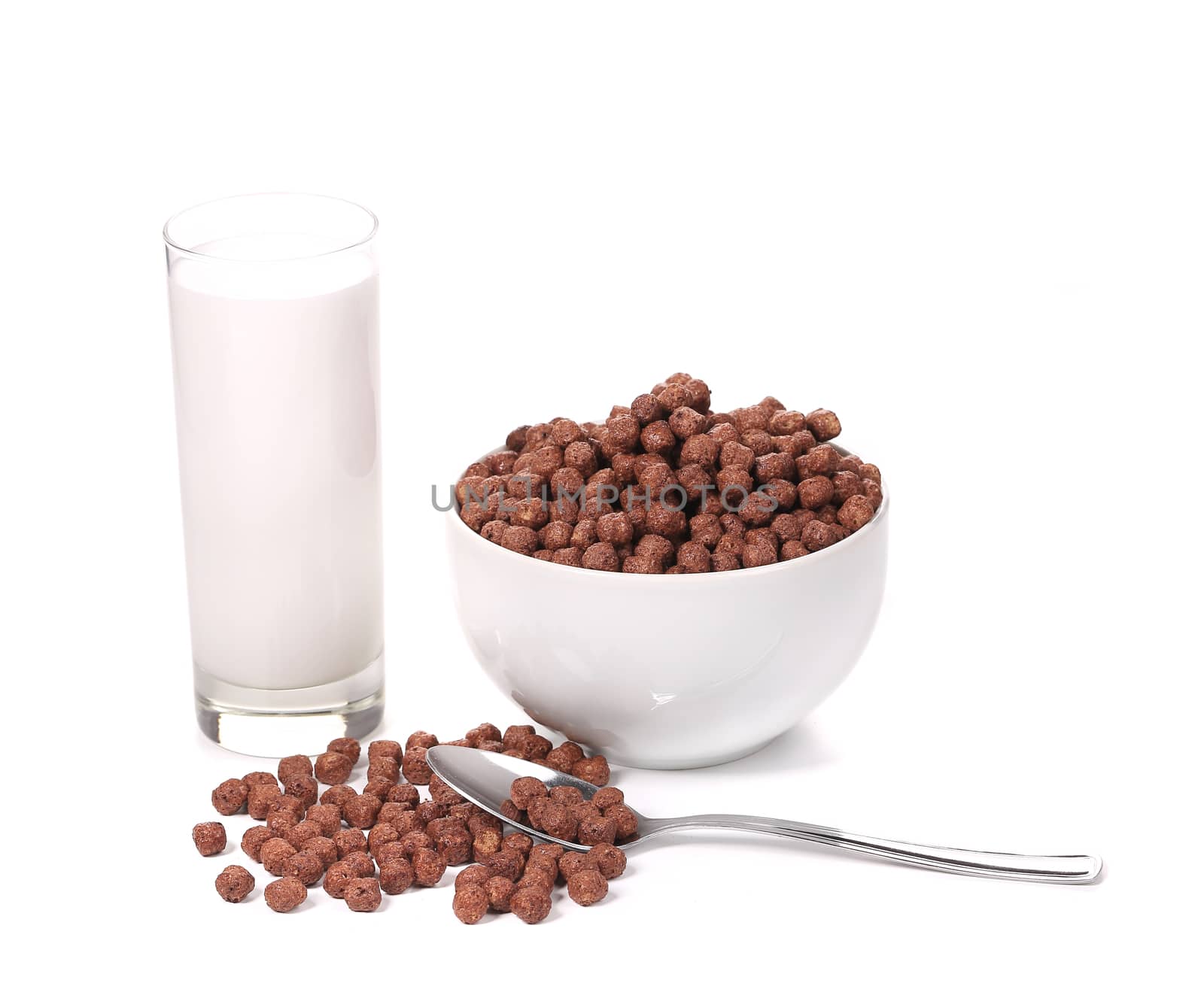 Bowl of chocolate flakes and milk. Isolated on a white background.