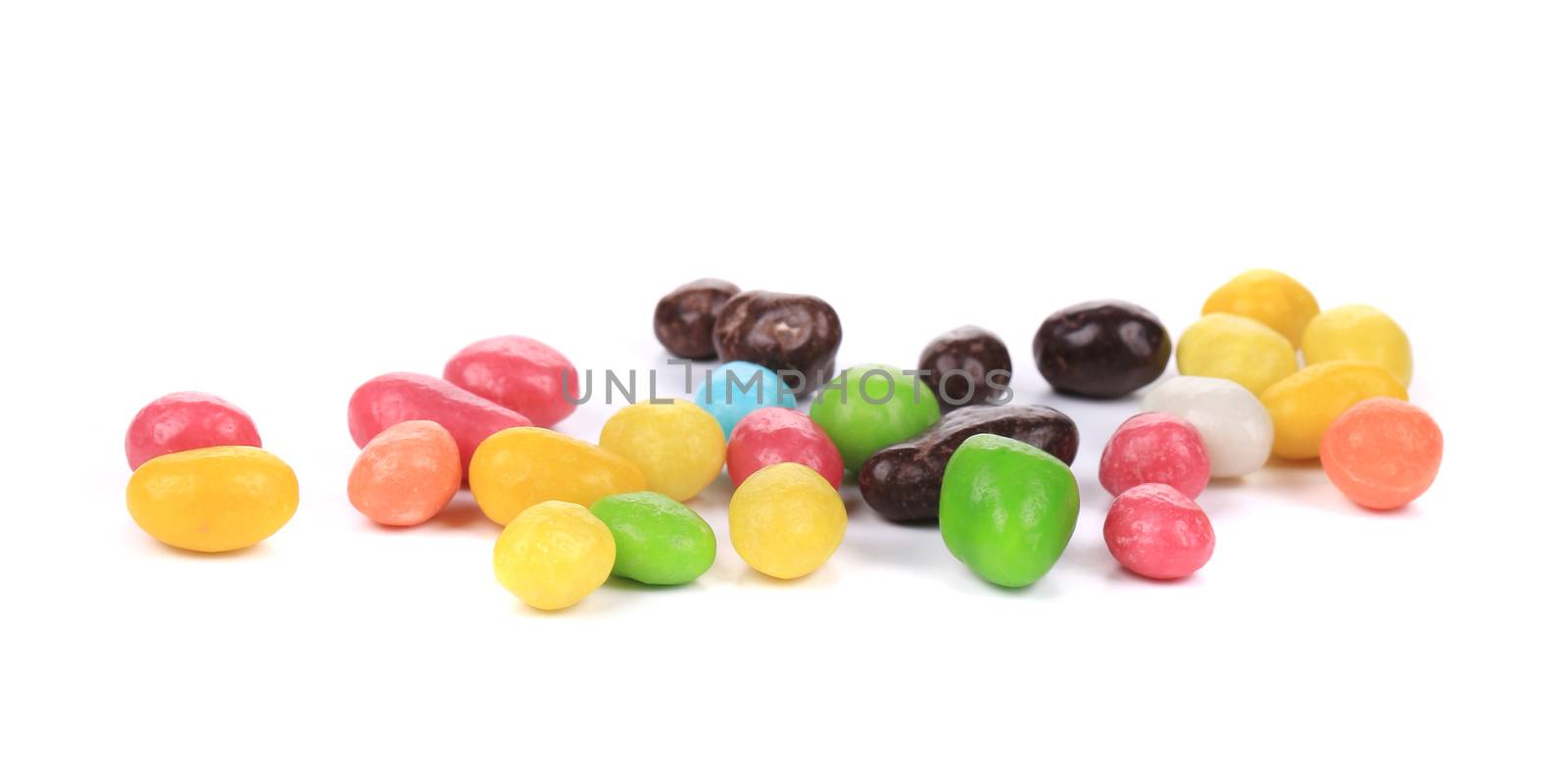 Heap of sweet colorful glaze candies. Isolated on a white background.