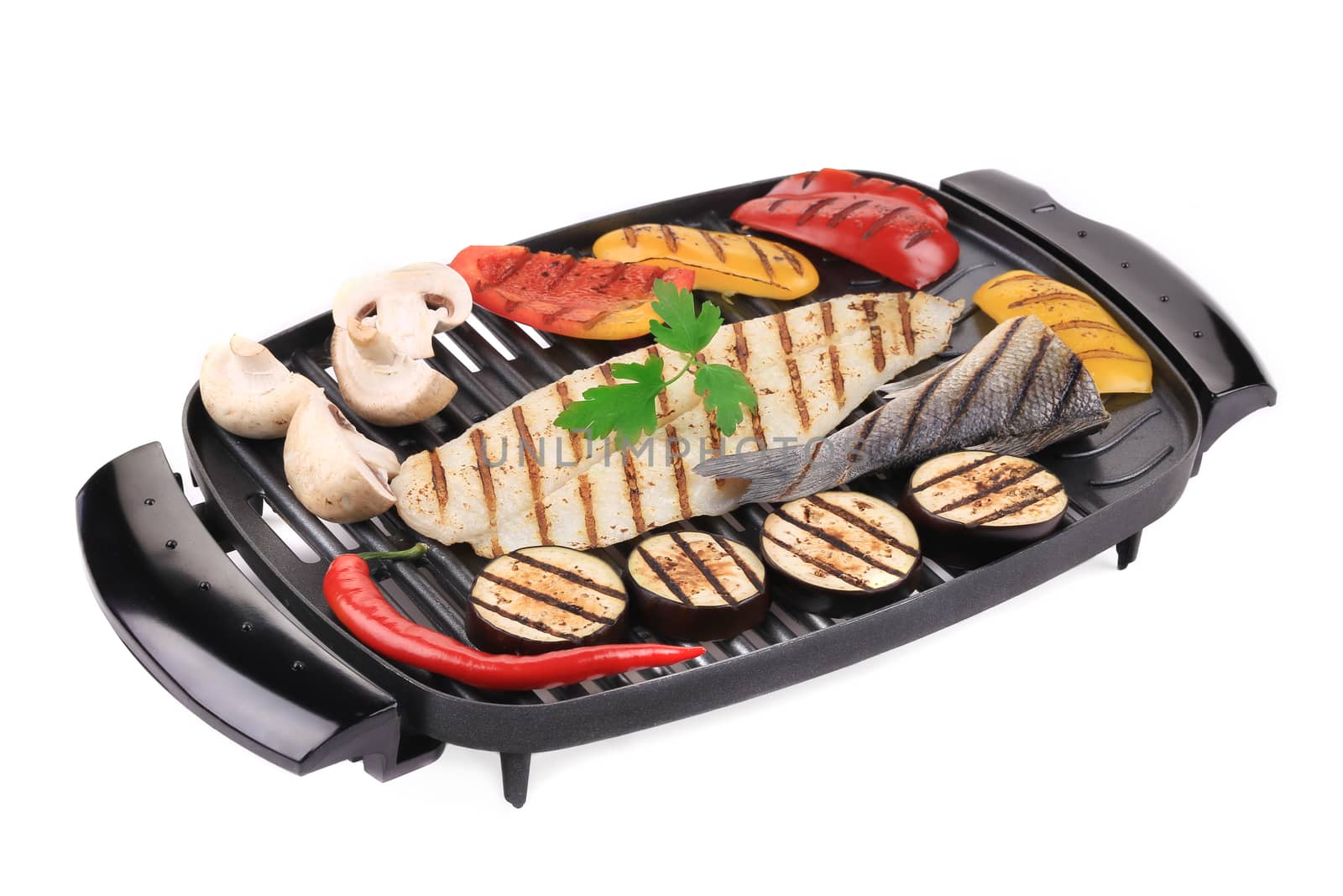 Grilled fish fillets with vegetables. Isolated on a white background.
