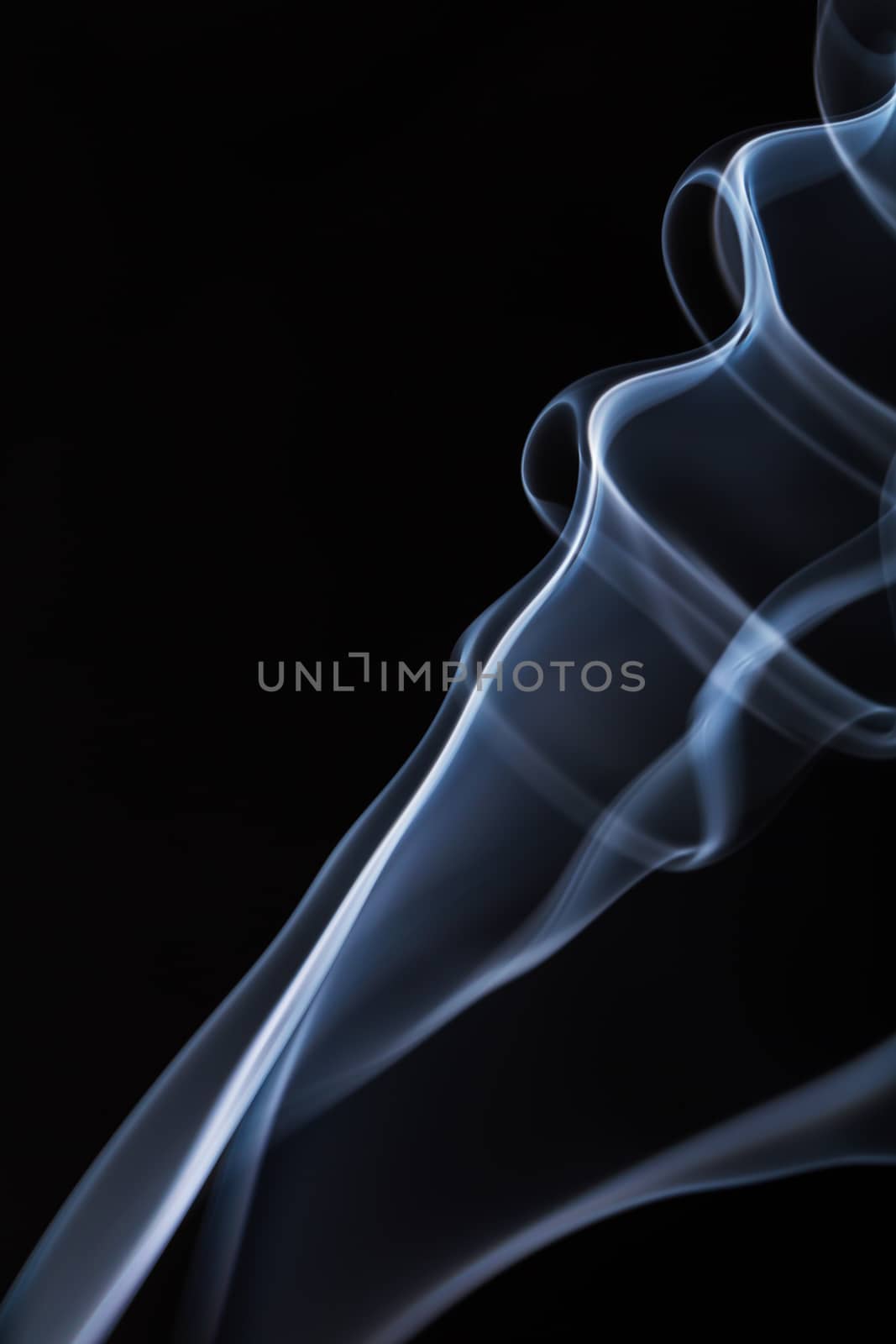 Abstract smoke on black background.